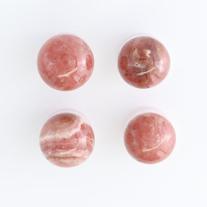 Rhodochrosite Spheres Set of 10 | Mi Esperanza Minerals | Supplier of Crystals and Onyx