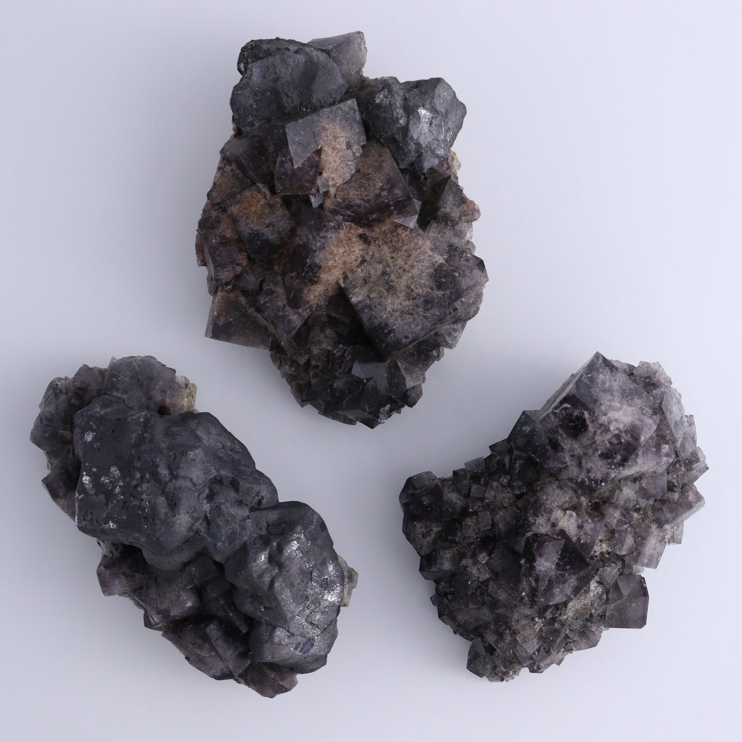 Fluorite Purple Rain Pocket Set of 7 - Expert Wholesale and Supplier of Wholesale Crystals & Bulk Gemstones, ["close_50","England","Fluorite","Purple Rain Pocket","Rough"]