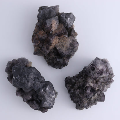 Fluorite Purple Rain Pocket Set of 7 - Expert Wholesale and Supplier of Wholesale Crystals & Bulk Gemstones, ["close_50","England","Fluorite","Purple Rain Pocket","Rough"]