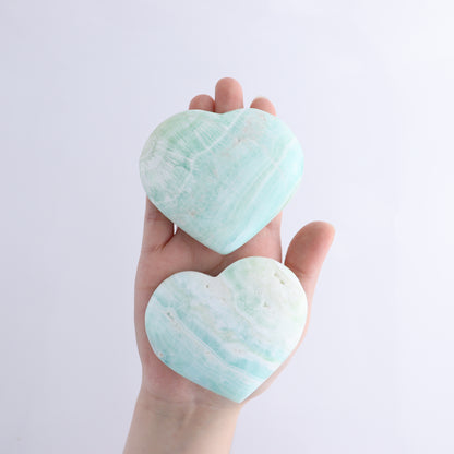 Caribbean Calcite Hearts Flat of 9 - Expert Wholesale and Supplier of Wholesale Crystals & Bulk Gemstones, ["Caribbean Calcite","Hearts","Madagascar"]