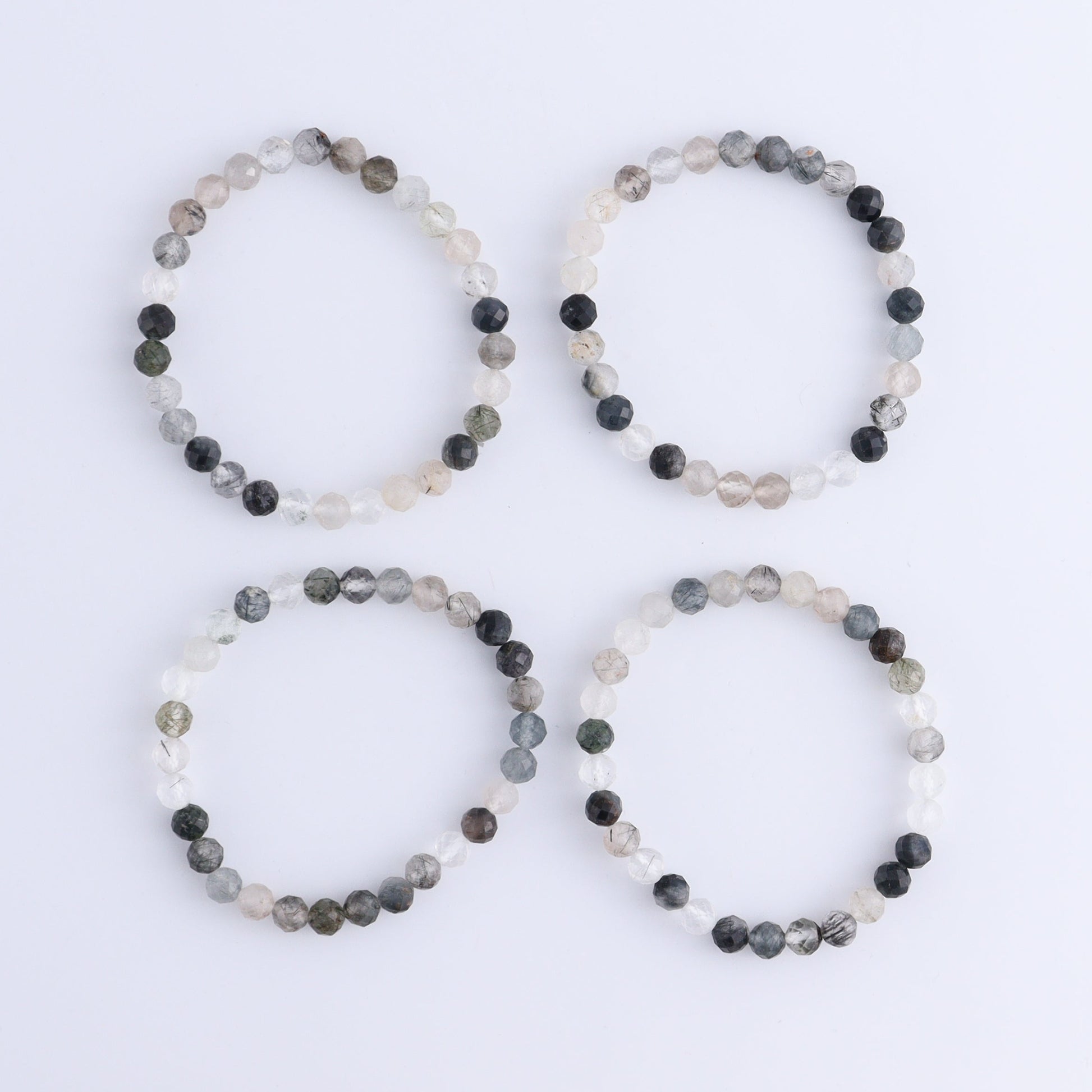 One Tourmaline in Quartz Faceted Bracelet - Expert Wholesale and Supplier of Wholesale Crystals & Bulk Gemstones, ["Bracelet","bracelets","Quartz","Tourmaline"]