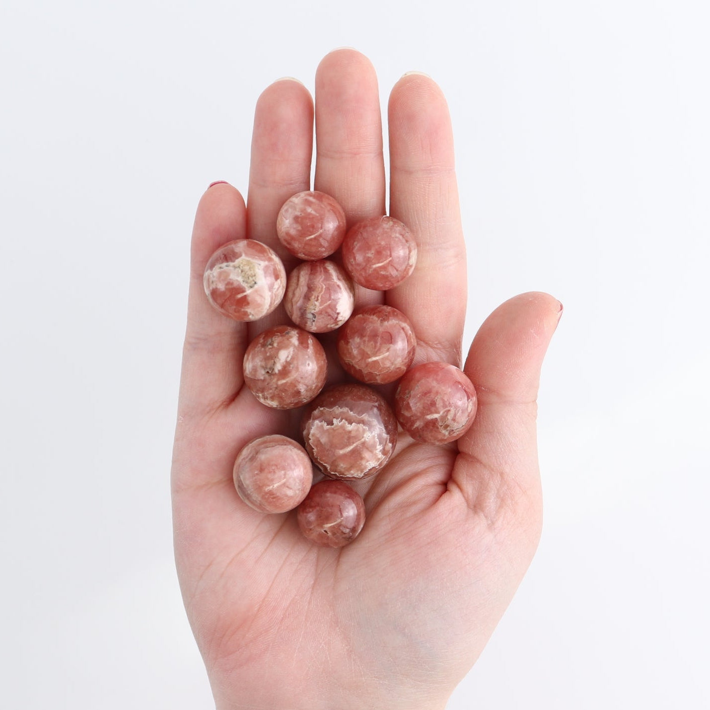 Rhodochrosite Spheres Set of 10 | Mi Esperanza Minerals | Supplier of Crystals and Onyx