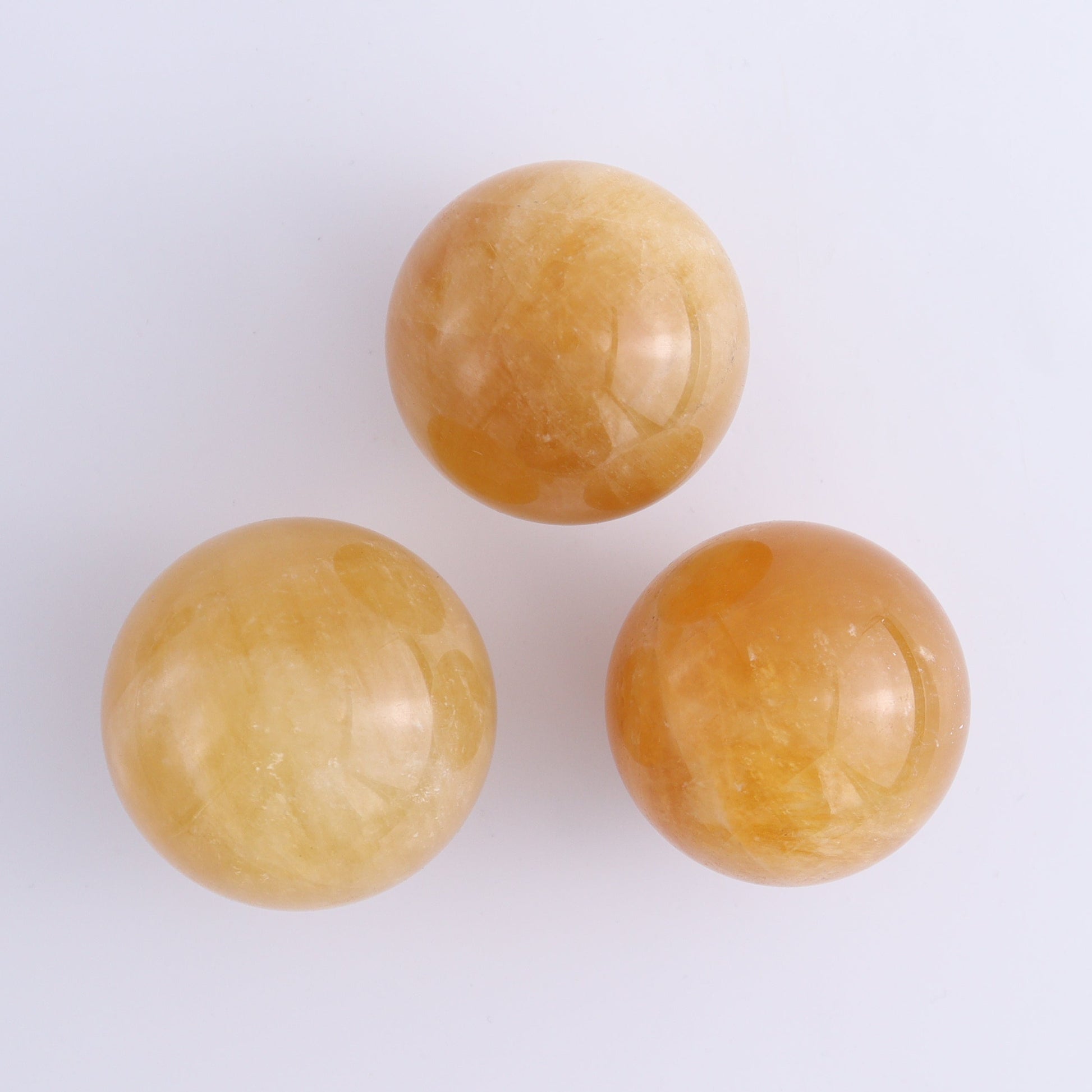 Calcite Spheres Set of 9 - Expert Wholesale and Supplier of Wholesale Crystals & Bulk Gemstones, ["Calcite","Mexico","Spheres"]