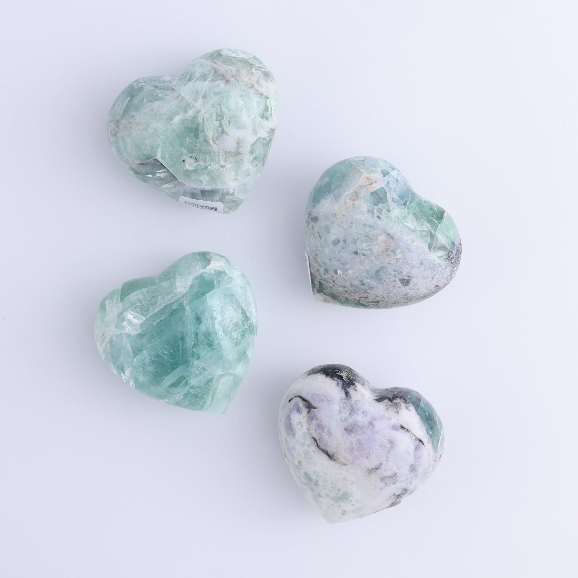 Fluorite Hearts Set of 7 - Expert Wholesale and Supplier of Wholesale Crystals & Bulk Gemstones, ["Fluorite","Hearts","Mexico"]