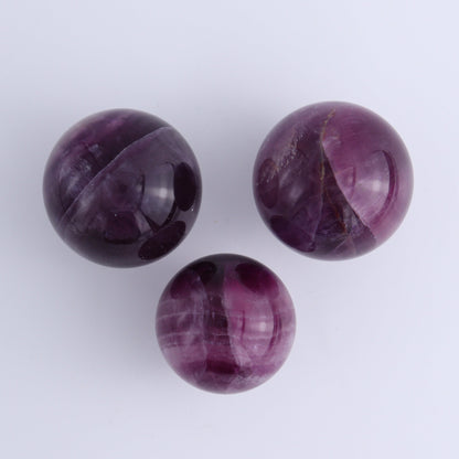 Purple Fluorite Spheres Set of 9 - Expert Wholesale and Supplier of Wholesale Crystals & Bulk Gemstones, ["Fluorite","Purple Fluorite","Spheres"]