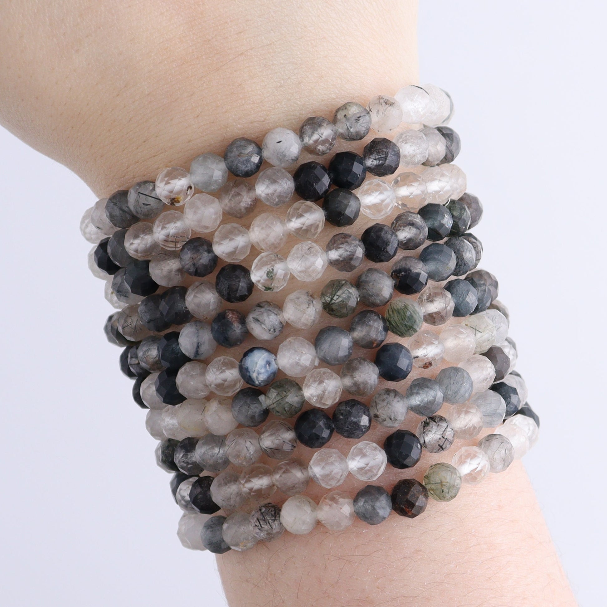 One Tourmaline in Quartz Faceted Bracelet - Expert Wholesale and Supplier of Wholesale Crystals & Bulk Gemstones, ["Bracelet","bracelets","Quartz","Tourmaline"]