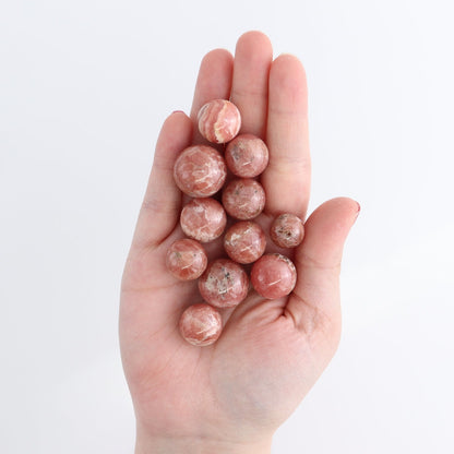 Rhodochrosite Spheres Set of 11 | Mi Esperanza Minerals | Supplier of Crystals and Onyx
