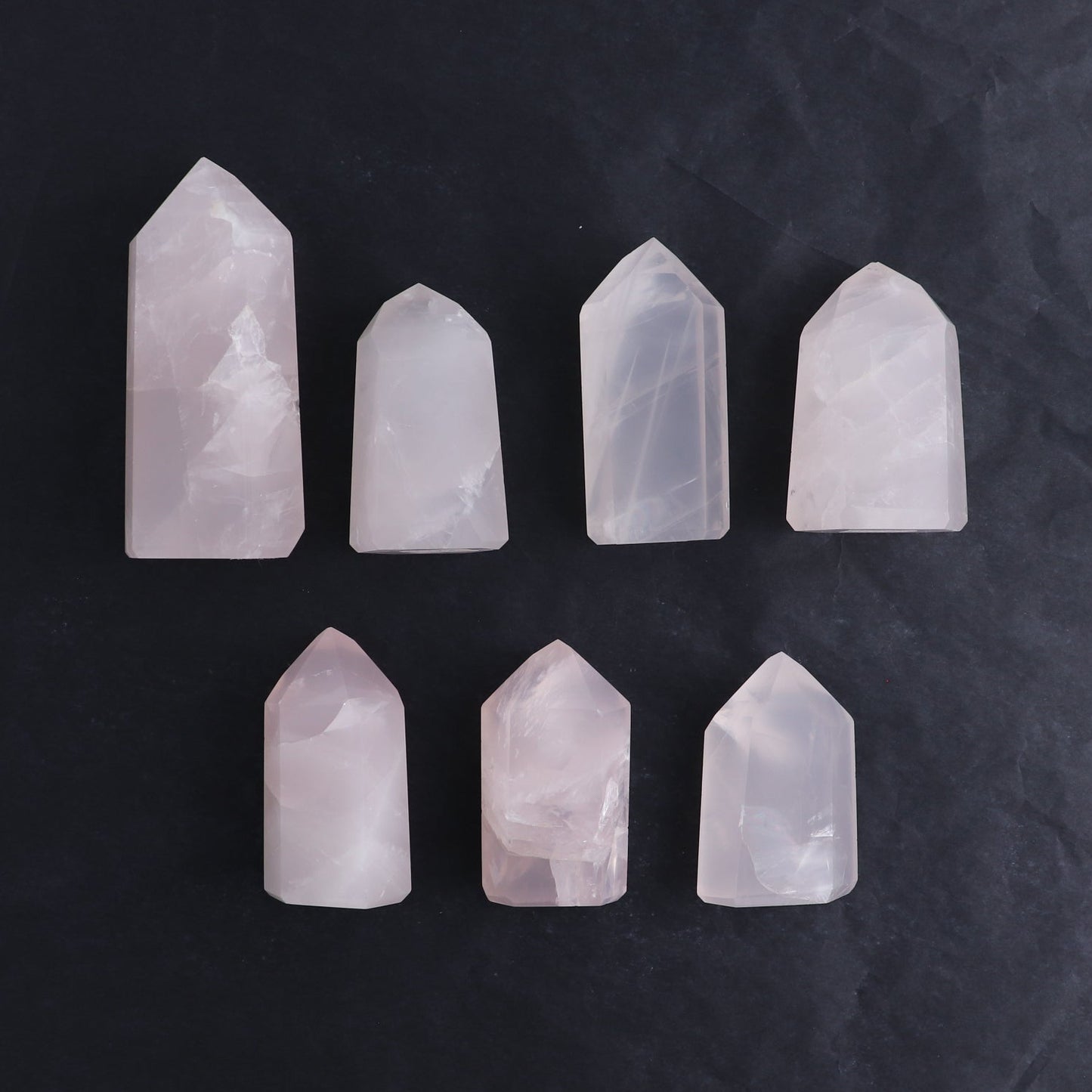 Imperfect Rose Quartz Towers Set of 7 - Expert Wholesale and Supplier of Wholesale Crystals & Bulk Gemstones, ["Brazil","Points","Quartz","Rose Quartz","Towers"]