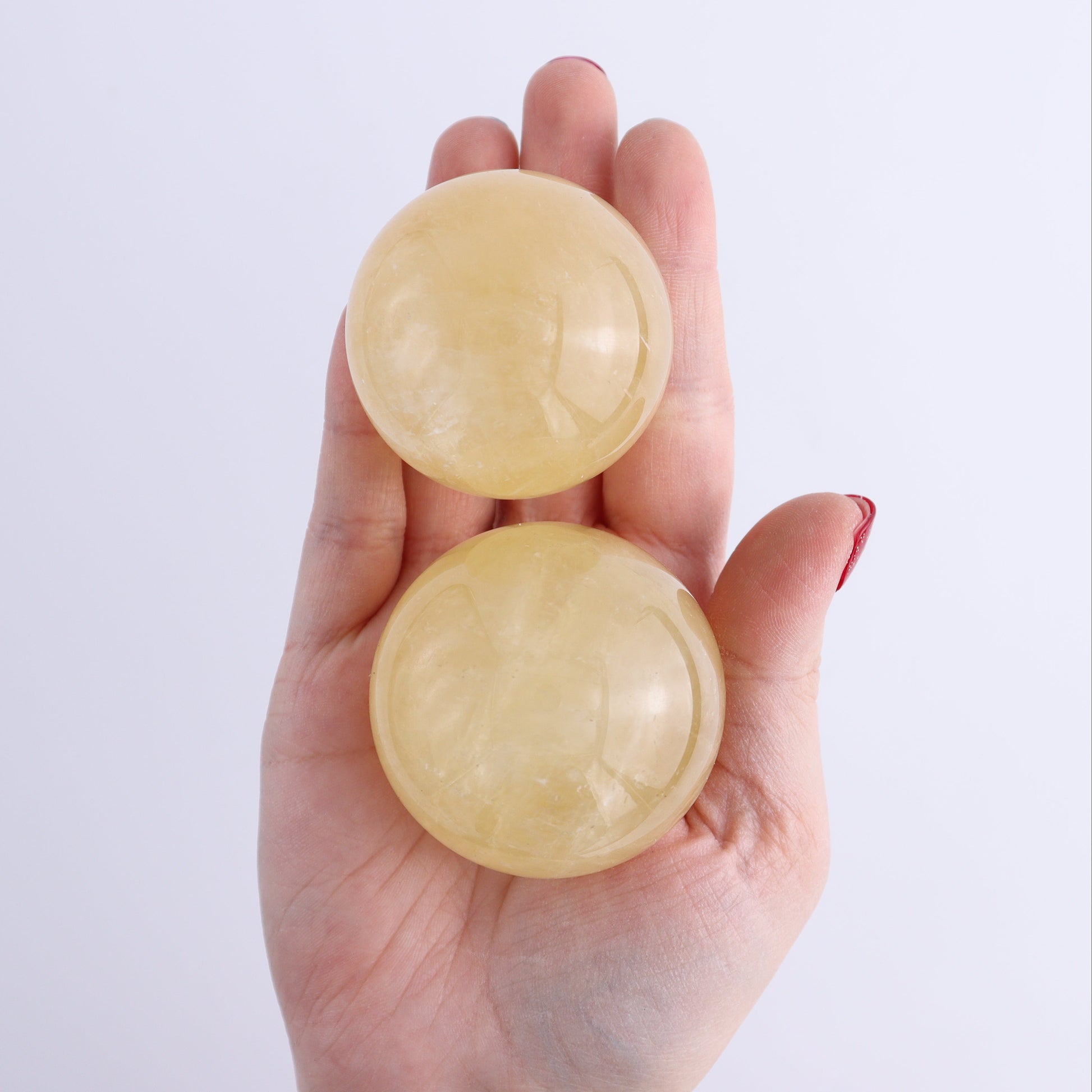 Calcite Spheres Set of 9 - Expert Wholesale and Supplier of Wholesale Crystals & Bulk Gemstones, ["Calcite","Mexico","Spheres"]