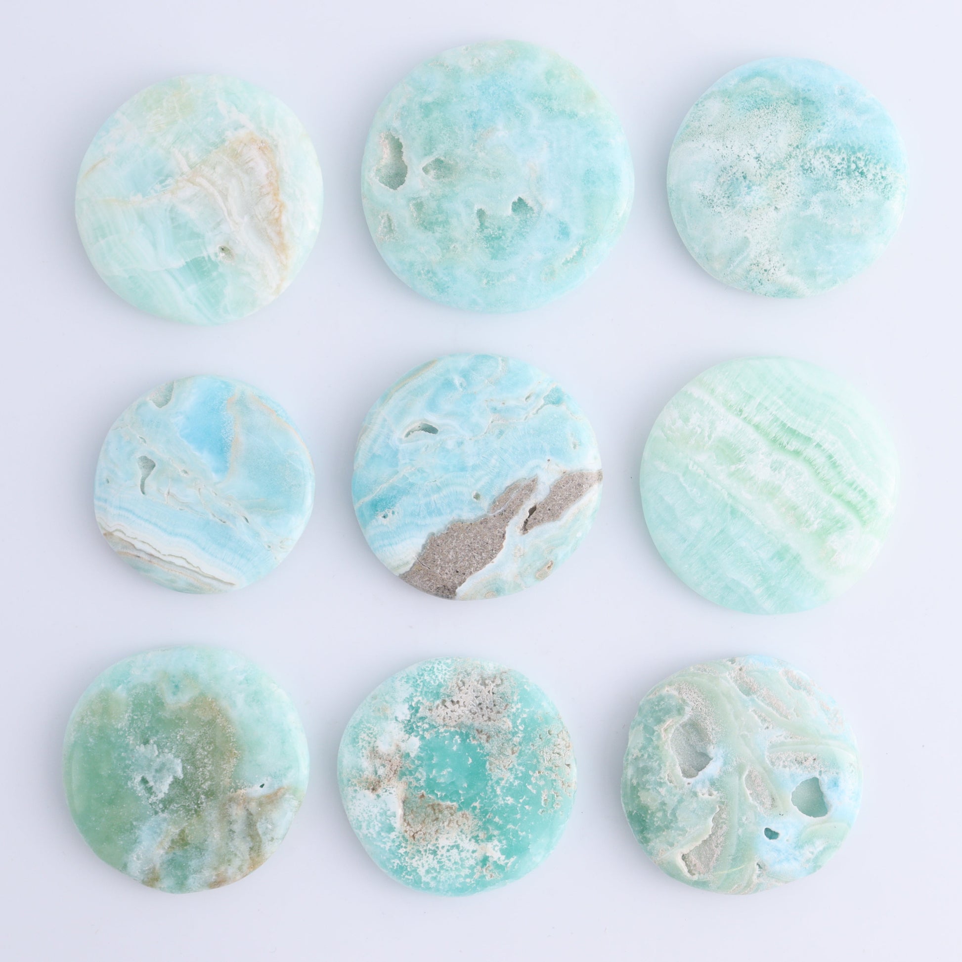 One Caribbean Calcite Flat Stone - Expert Wholesale and Supplier of Wholesale Crystals & Bulk Gemstones, ["Calcite","Caribbean Calcite","Flat Stone","Pakistan"]