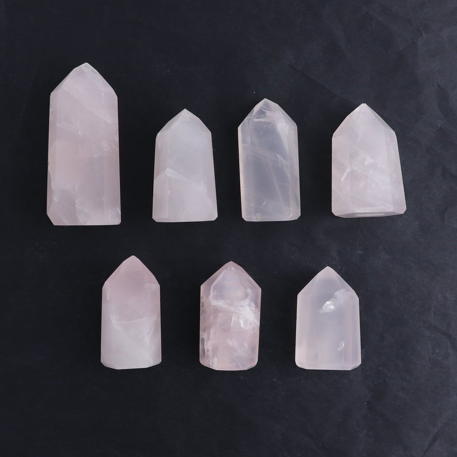 Imperfect Rose Quartz Towers Set of 7 - Expert Wholesale and Supplier of Wholesale Crystals & Bulk Gemstones, ["Brazil","Points","Quartz","Rose Quartz","Towers"]
