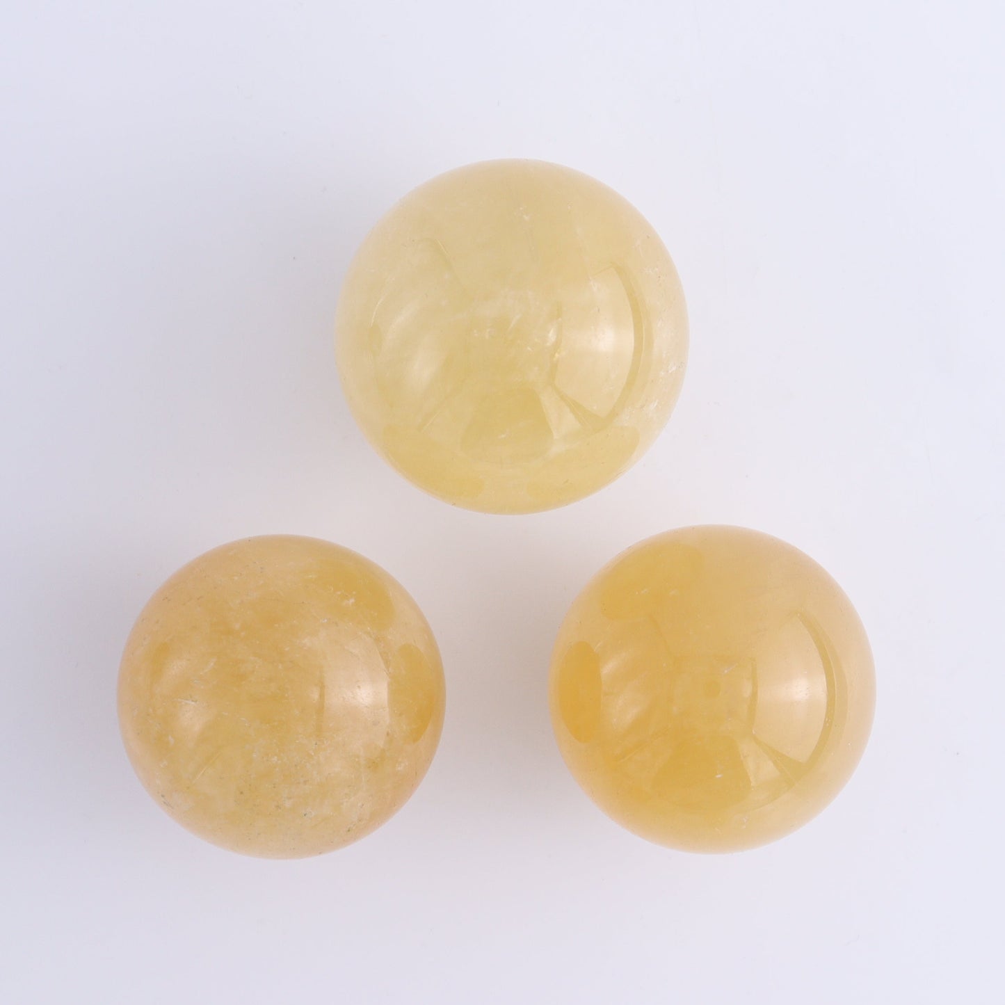 Calcite Spheres Set of 9 - Expert Wholesale and Supplier of Wholesale Crystals & Bulk Gemstones, ["Calcite","Mexico","Spheres"]