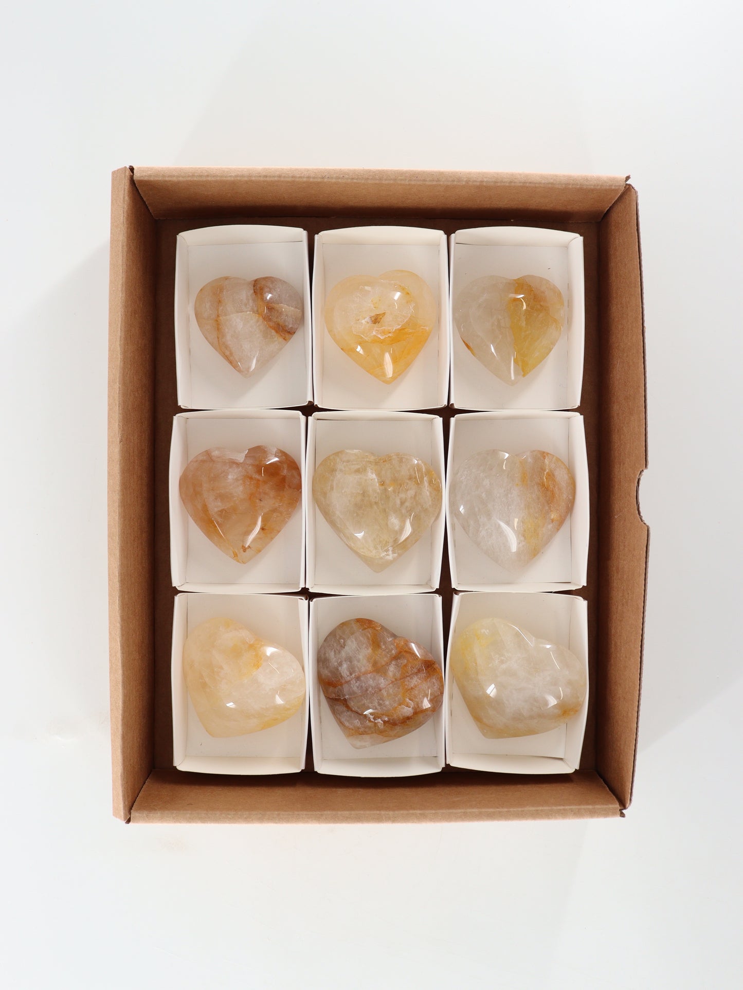 Golden Healer Quartz Hearts Set of 9 - Expert Wholesale and Supplier of Wholesale Crystals & Bulk Gemstones, []