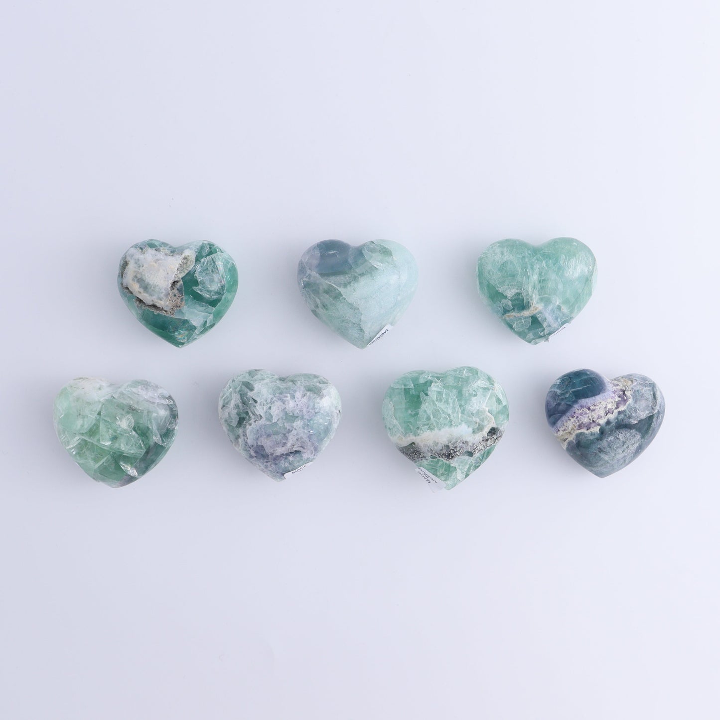 Fluorite Hearts Set of 7 - Expert Wholesale and Supplier of Wholesale Crystals & Bulk Gemstones, ["Fluorite","Hearts","Mexico"]