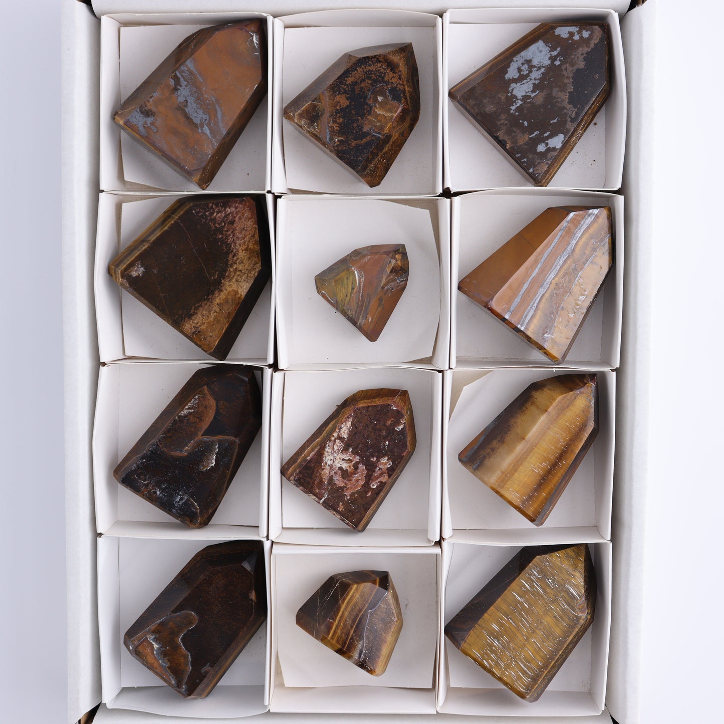 Tiger Eye Towers Set of 12 - Expert Wholesale and Supplier of Wholesale Crystals & Bulk Gemstones, ["Brazil","close_50","Tiger Eye","Towers"]