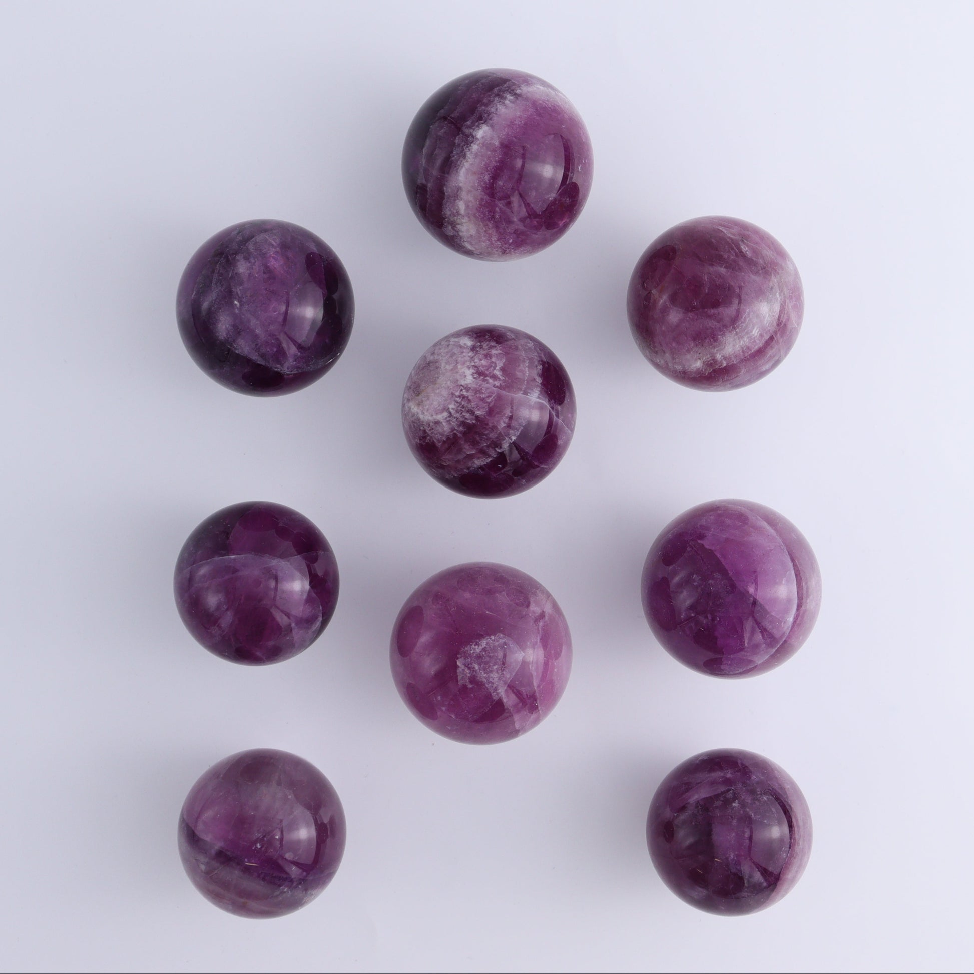 Purple Fluorite Spheres Set of 9 - Expert Wholesale and Supplier of Wholesale Crystals & Bulk Gemstones, ["Fluorite","Purple Fluorite","Spheres"]