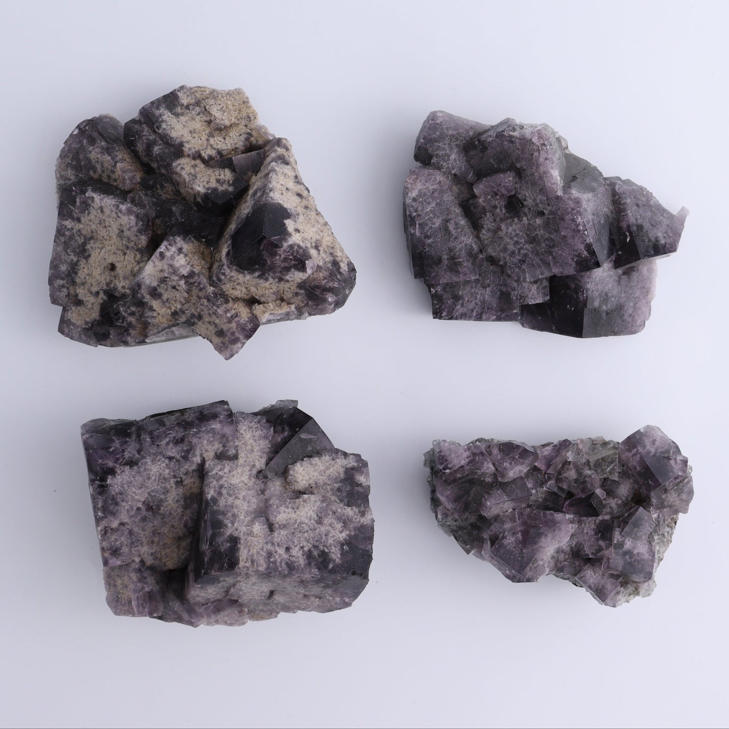 Purple Rain Pocket Fluorite Set of 4 - Expert Wholesale and Supplier of Wholesale Crystals & Bulk Gemstones, ["close_50","England","Fluorite","Purple Rain Pocket","Rough"]