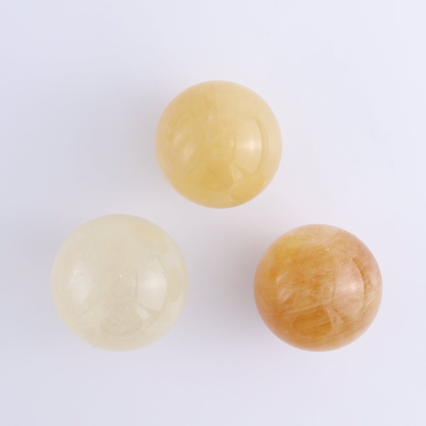 Calcite Spheres Set of 9 - Expert Wholesale and Supplier of Wholesale Crystals & Bulk Gemstones, ["Calcite","Mexico","Spheres"]