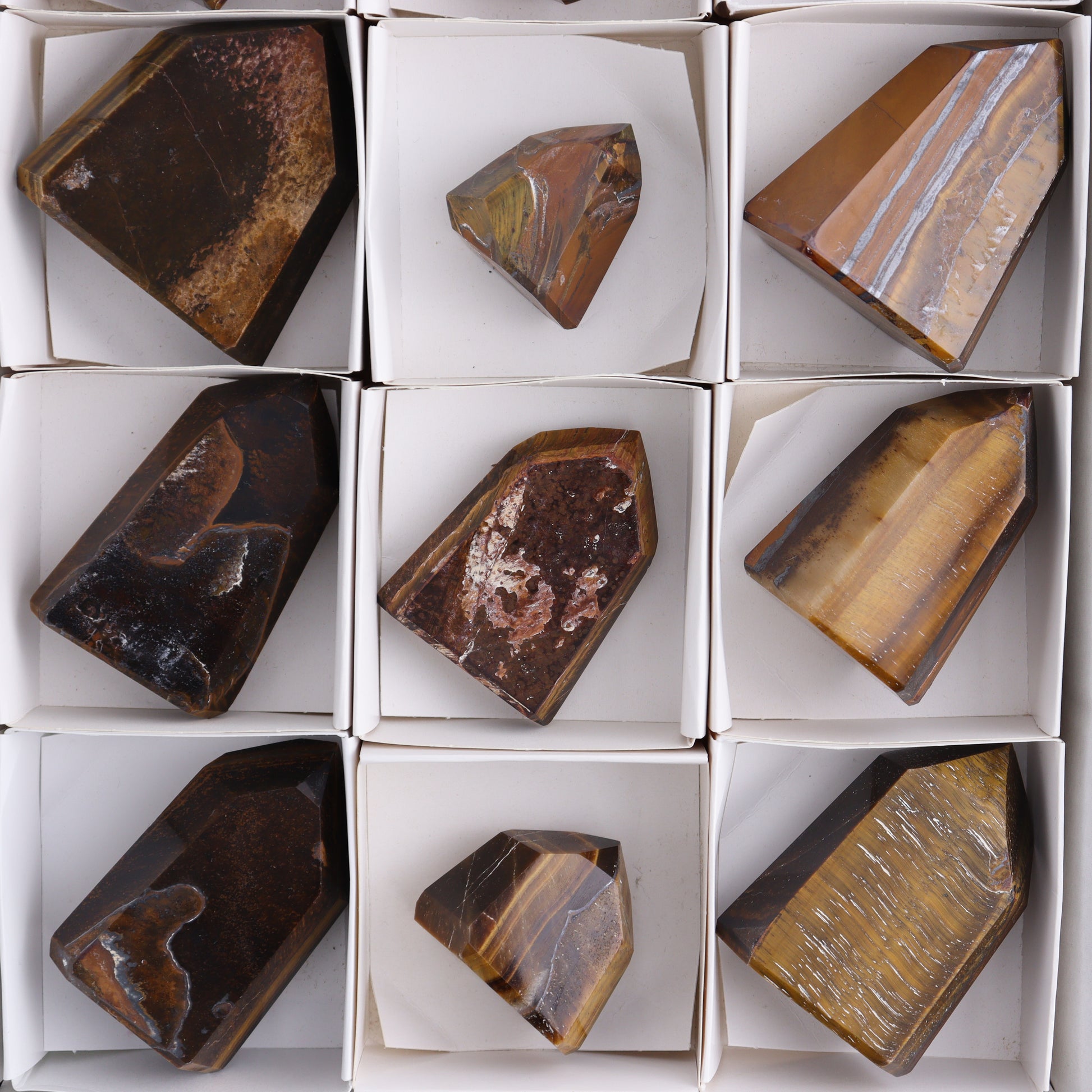 Tiger Eye Towers Set of 12 - Expert Wholesale and Supplier of Wholesale Crystals & Bulk Gemstones, ["Brazil","close_50","Tiger Eye","Towers"]