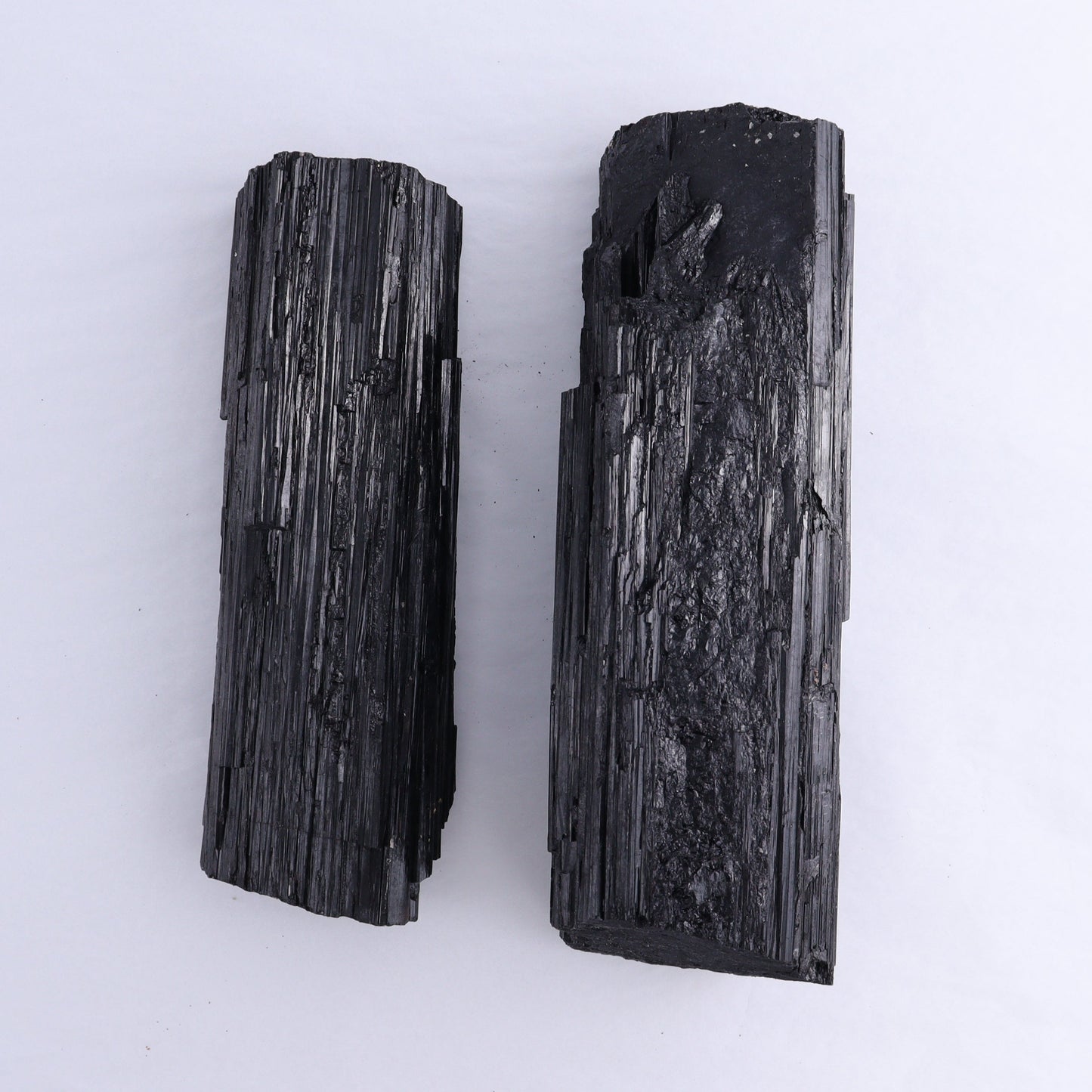 Black Tourmaline Log Set of 2 - Expert Wholesale and Supplier of Wholesale Crystals & Bulk Gemstones, ["Black Tourmaline","logs","Madagascar","Rough","Tourmaline"]