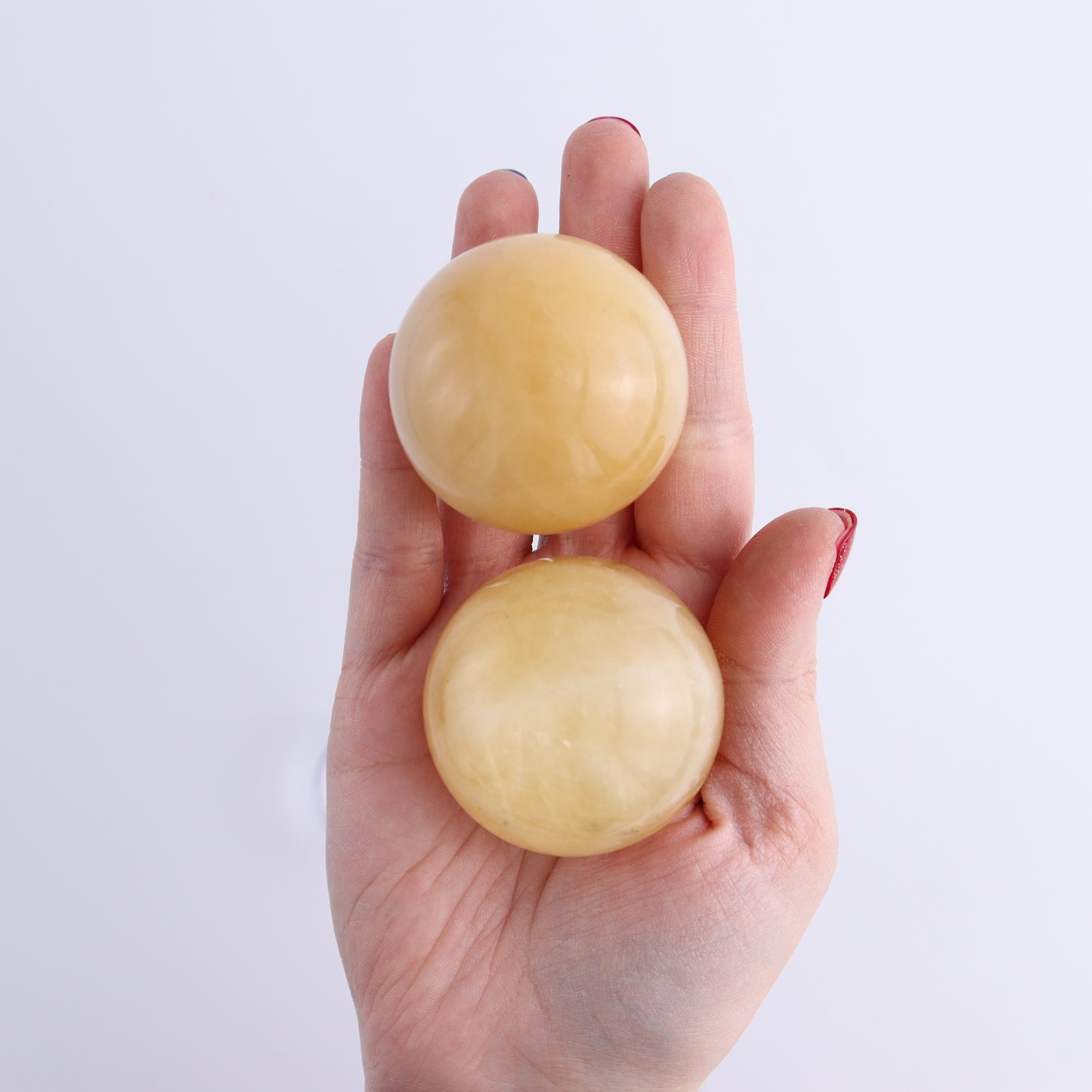 Calcite Spheres Set of 9 - Expert Wholesale and Supplier of Wholesale Crystals & Bulk Gemstones, ["Calcite","Mexico","Spheres"]