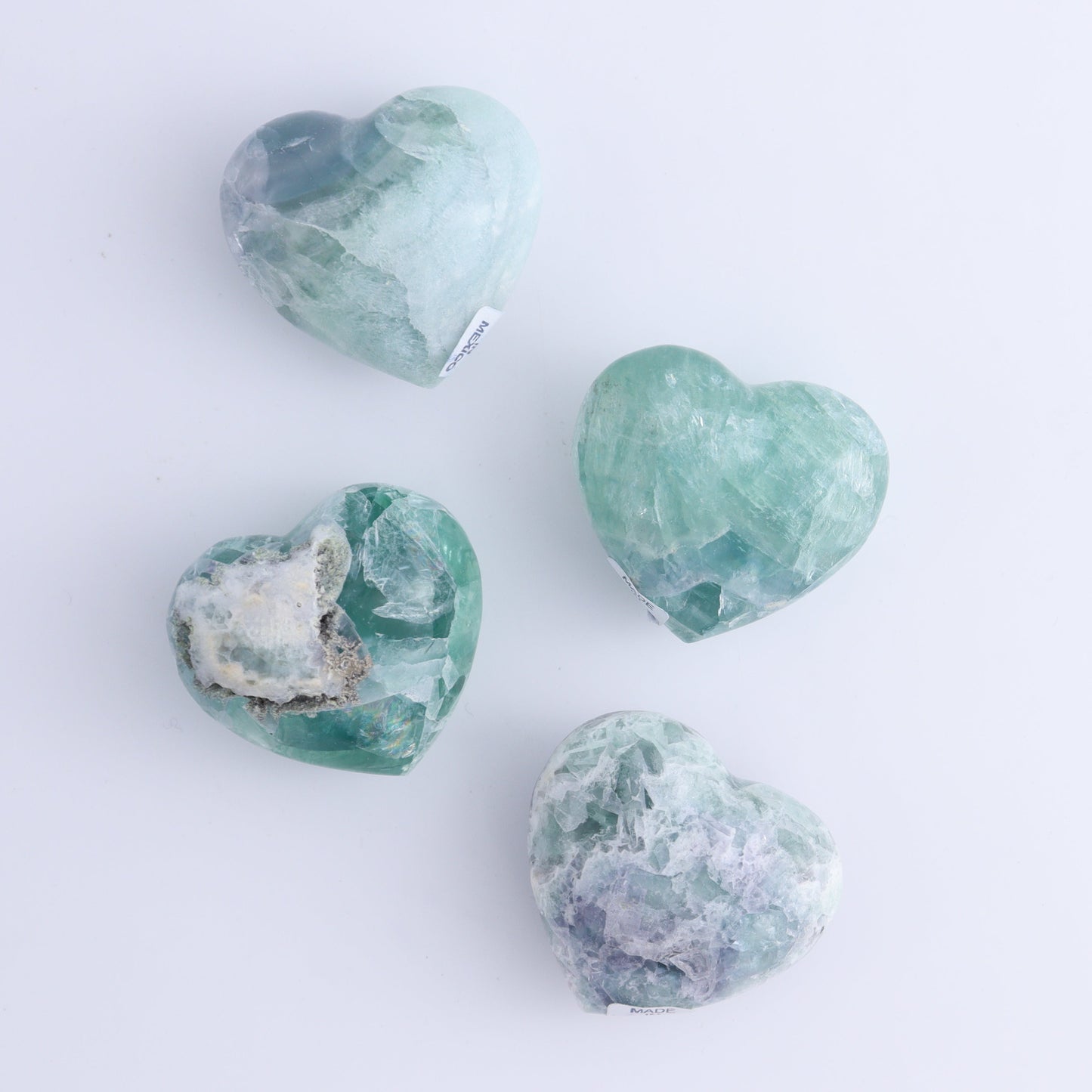 Fluorite Hearts Set of 7 - Expert Wholesale and Supplier of Wholesale Crystals & Bulk Gemstones, ["Fluorite","Hearts","Mexico"]