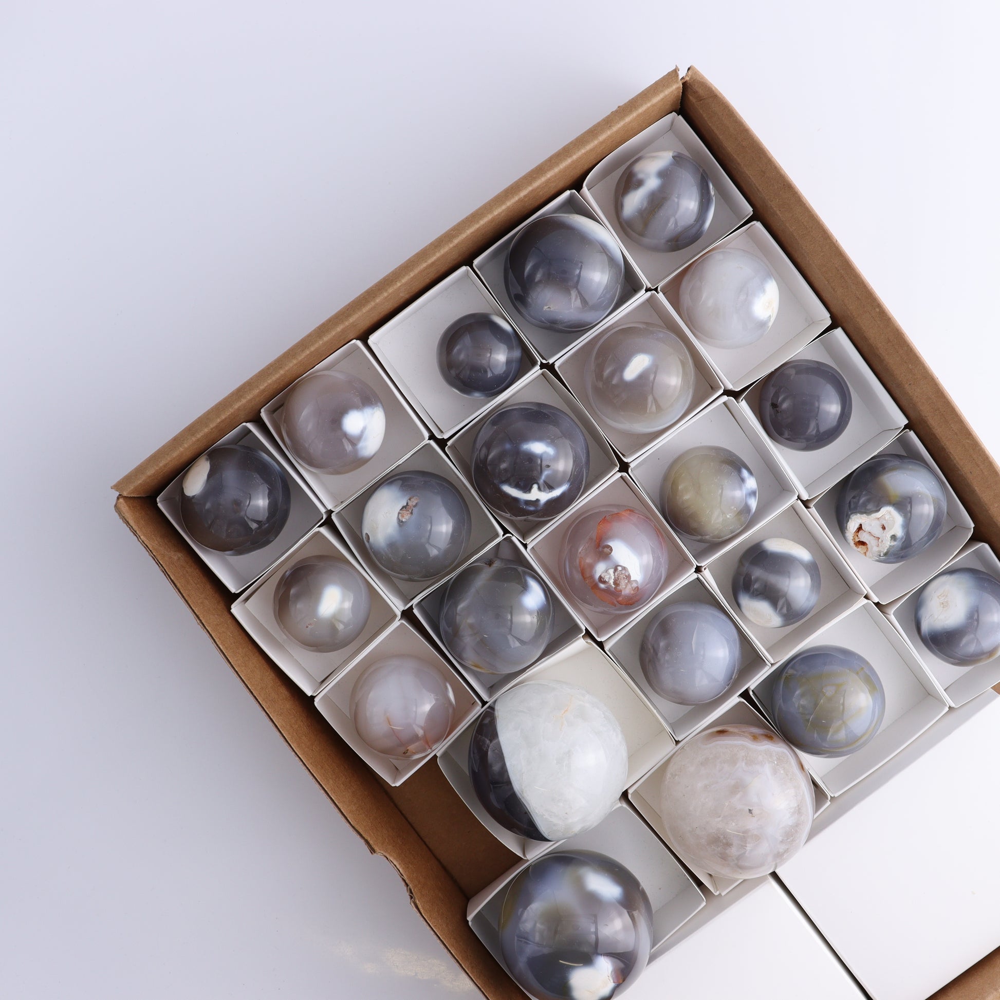 Orca Agate Spheres Set of 23 - Expert Wholesale and Supplier of Wholesale Crystals & Bulk Gemstones, ["Madagascar","Orca Agate","Spheres"]