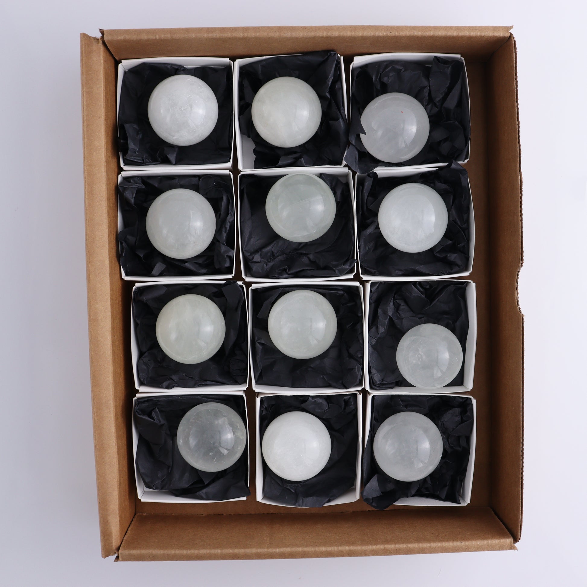 Optical Calcite Spheres Set of 12 - Expert Wholesale and Supplier of Wholesale Crystals & Bulk Gemstones, ["Calcite","Mexico","Optical Calcite","Spheres"]