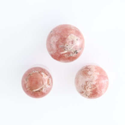 Rhodochrosite Spheres Set of 11 | Mi Esperanza Minerals | Supplier of Crystals and Onyx