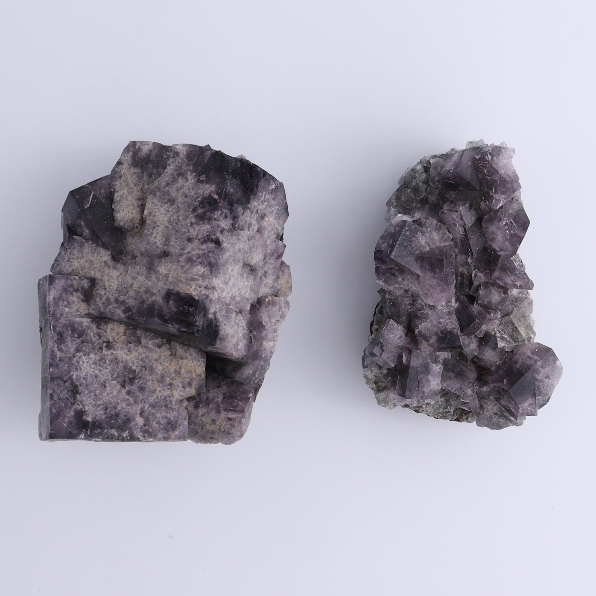 Purple Rain Pocket Fluorite Set of 4 - Expert Wholesale and Supplier of Wholesale Crystals & Bulk Gemstones, ["close_50","England","Fluorite","Purple Rain Pocket","Rough"]