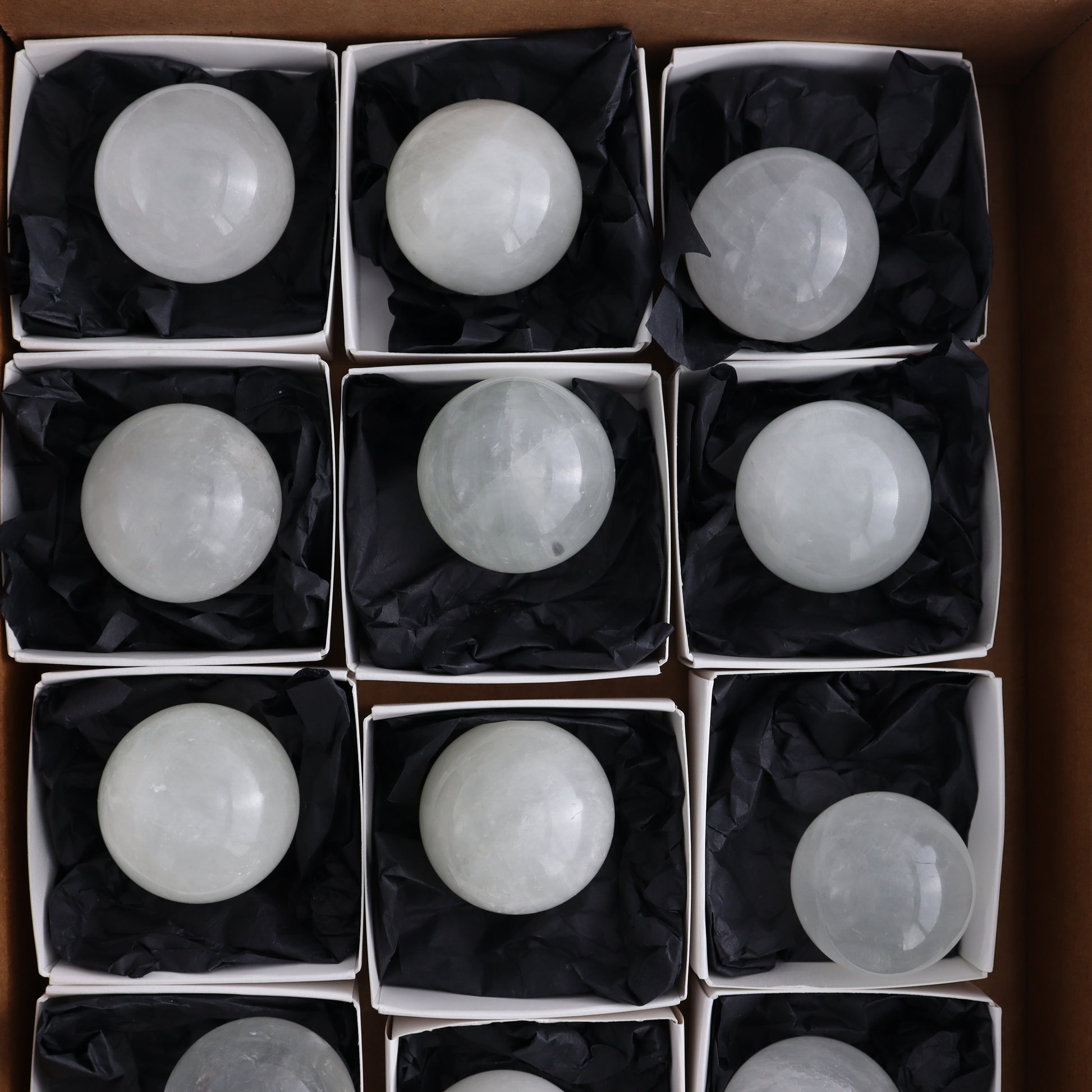 Optical Calcite Spheres Set of 12 - Expert Wholesale and Supplier of Wholesale Crystals & Bulk Gemstones, ["Calcite","Mexico","Optical Calcite","Spheres"]