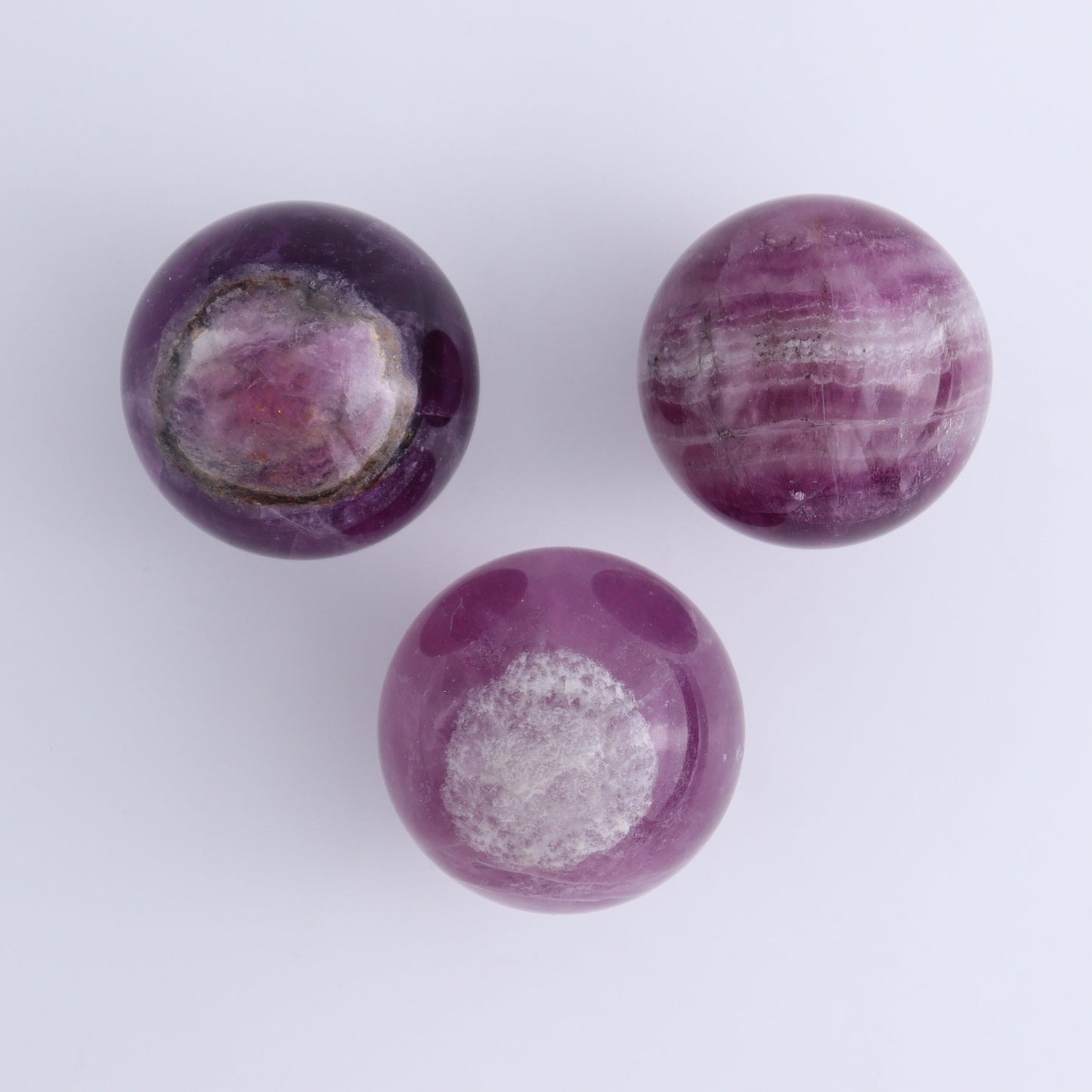 Purple Fluorite Spheres Set of 9 - Expert Wholesale and Supplier of Wholesale Crystals & Bulk Gemstones, ["Fluorite","Purple Fluorite","Spheres"]