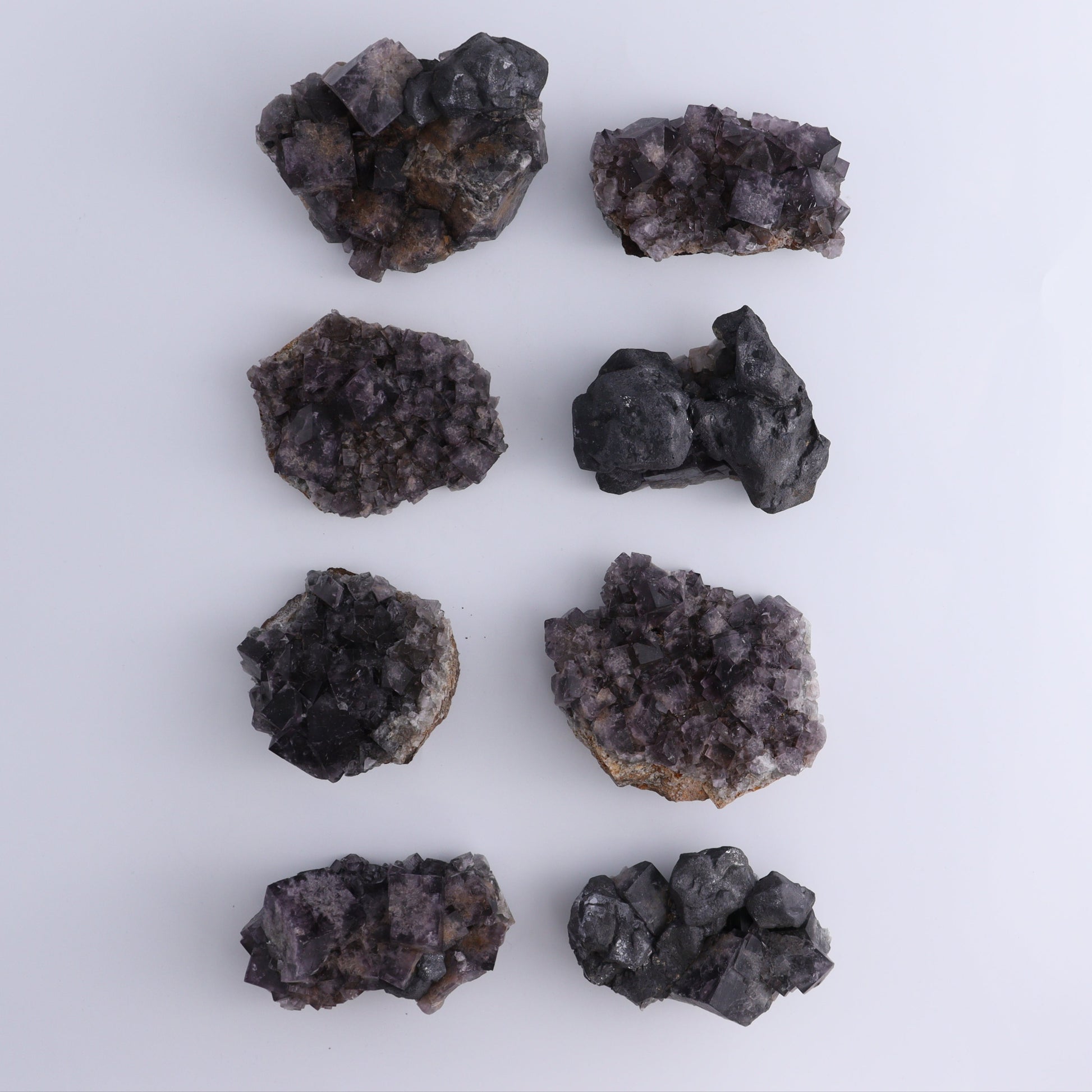 Fluorite Purple Rain Pocket Set of 8 - Expert Wholesale and Supplier of Wholesale Crystals & Bulk Gemstones, ["close_50","England","Fluorite","Purple Rain Pocket","Rough"]