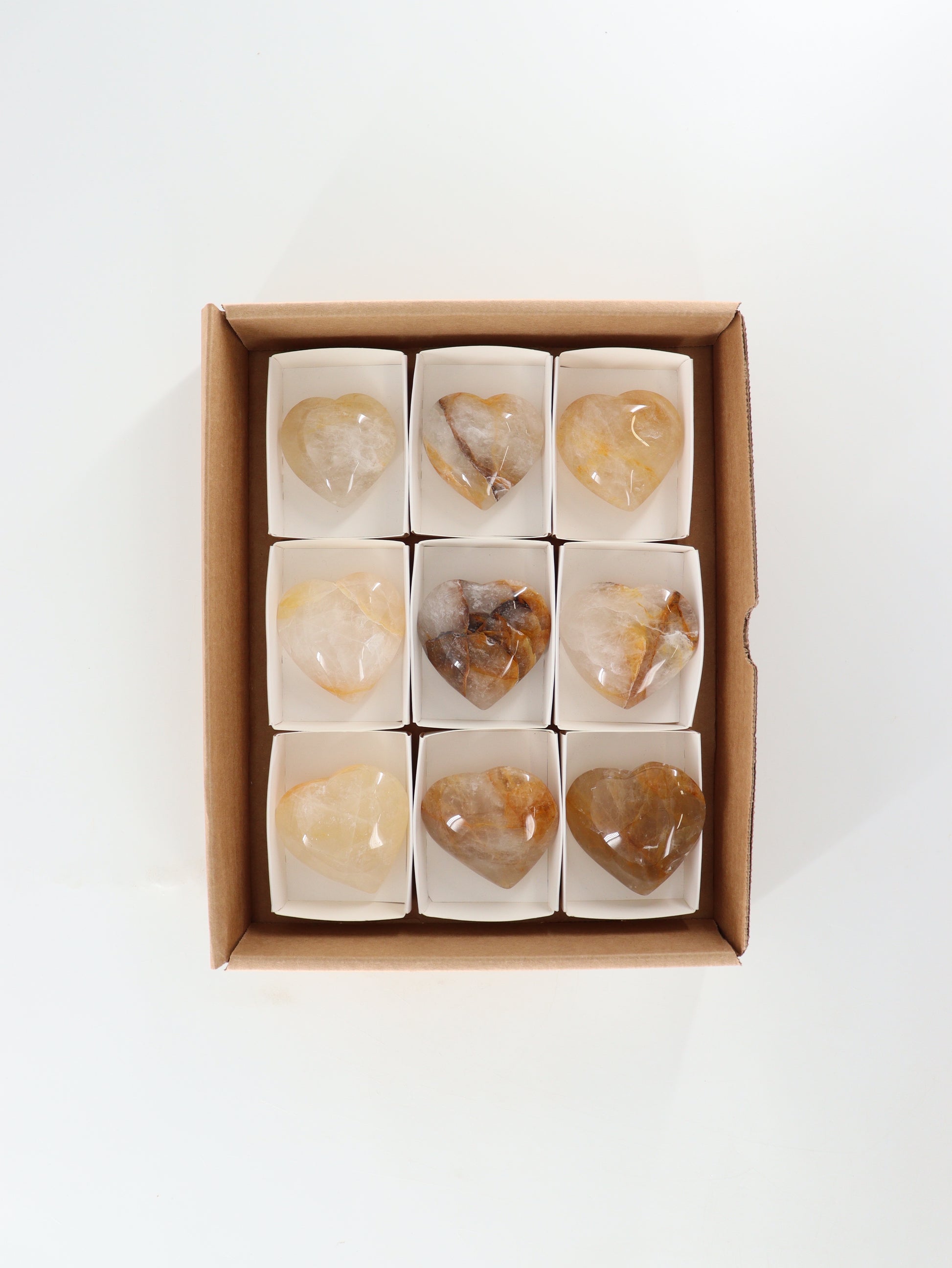 Golden Healer Quartz Hearts Set of 9 - Expert Wholesale and Supplier of Wholesale Crystals & Bulk Gemstones, []