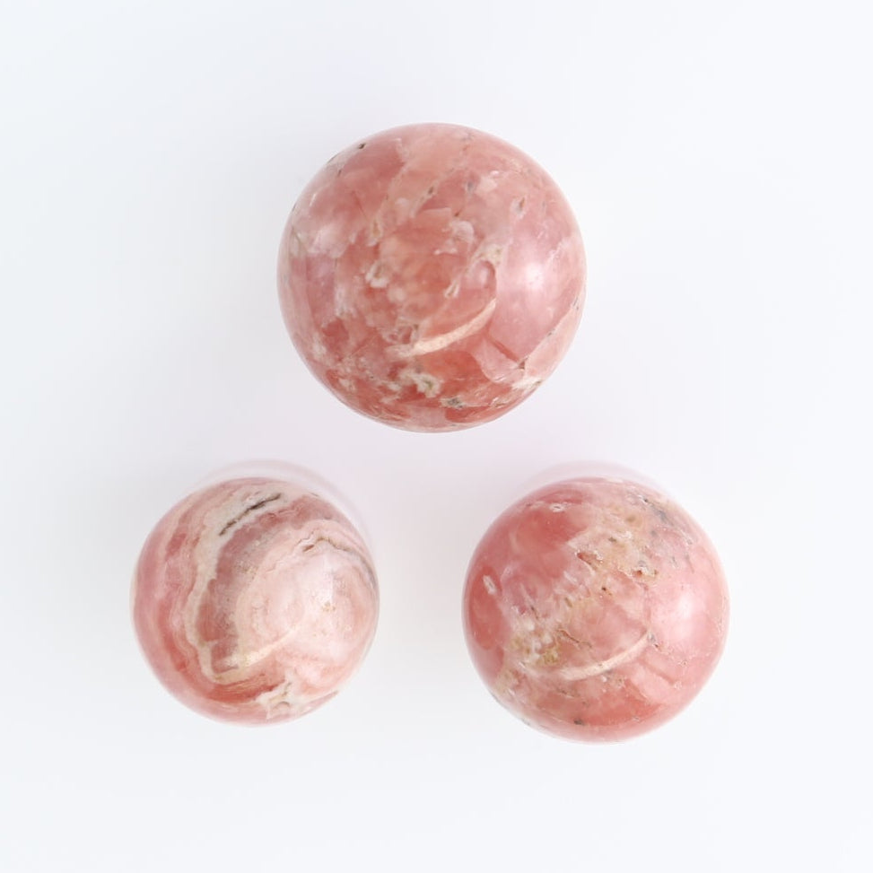 Rhodochrosite Spheres Set of 11 | Mi Esperanza Minerals | Supplier of Crystals and Onyx