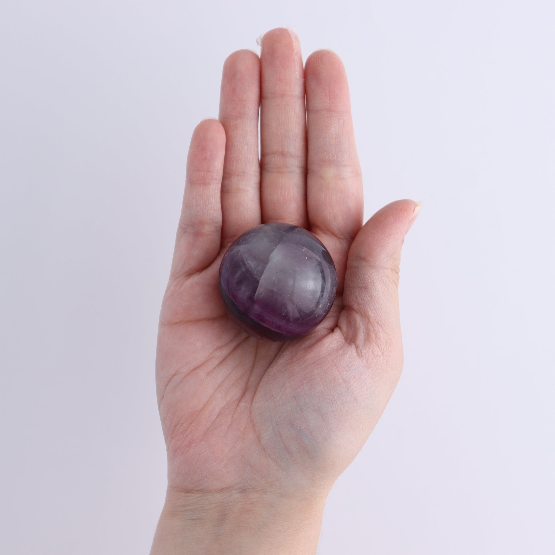 Purple Fluorite Spheres Set of 9 - Expert Wholesale and Supplier of Wholesale Crystals & Bulk Gemstones, ["Fluorite","Purple Fluorite","Spheres"]