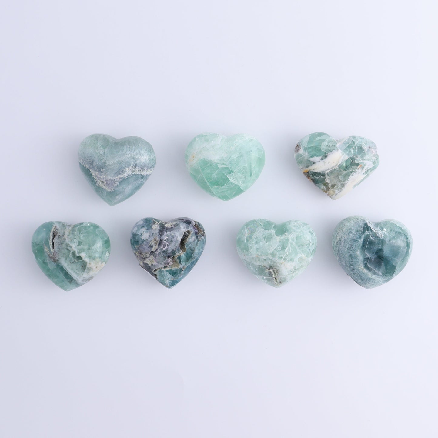 Fluorite Hearts Set of 7 - Expert Wholesale and Supplier of Wholesale Crystals & Bulk Gemstones, ["Fluorite","Hearts","Mexico"]