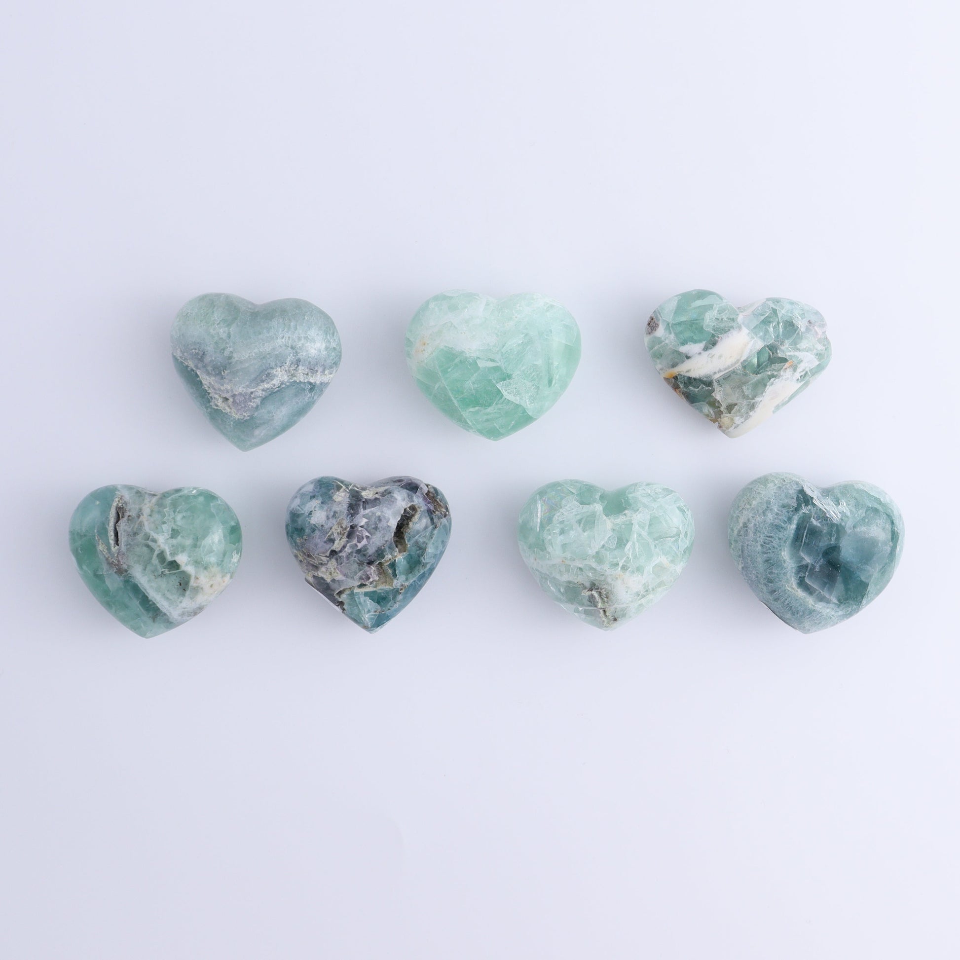 Fluorite Hearts Set of 7 - Expert Wholesale and Supplier of Wholesale Crystals & Bulk Gemstones, ["Fluorite","Hearts","Mexico"]