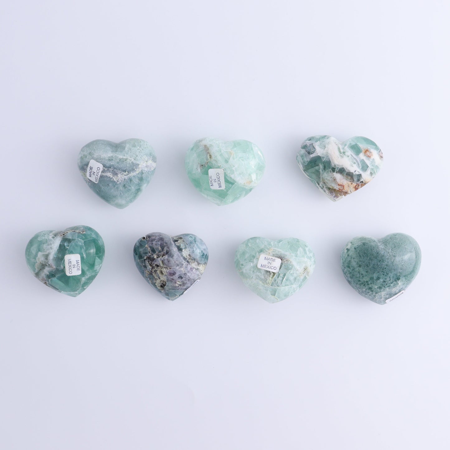 Fluorite Hearts Set of 7 - Expert Wholesale and Supplier of Wholesale Crystals & Bulk Gemstones, ["Fluorite","Hearts","Mexico"]