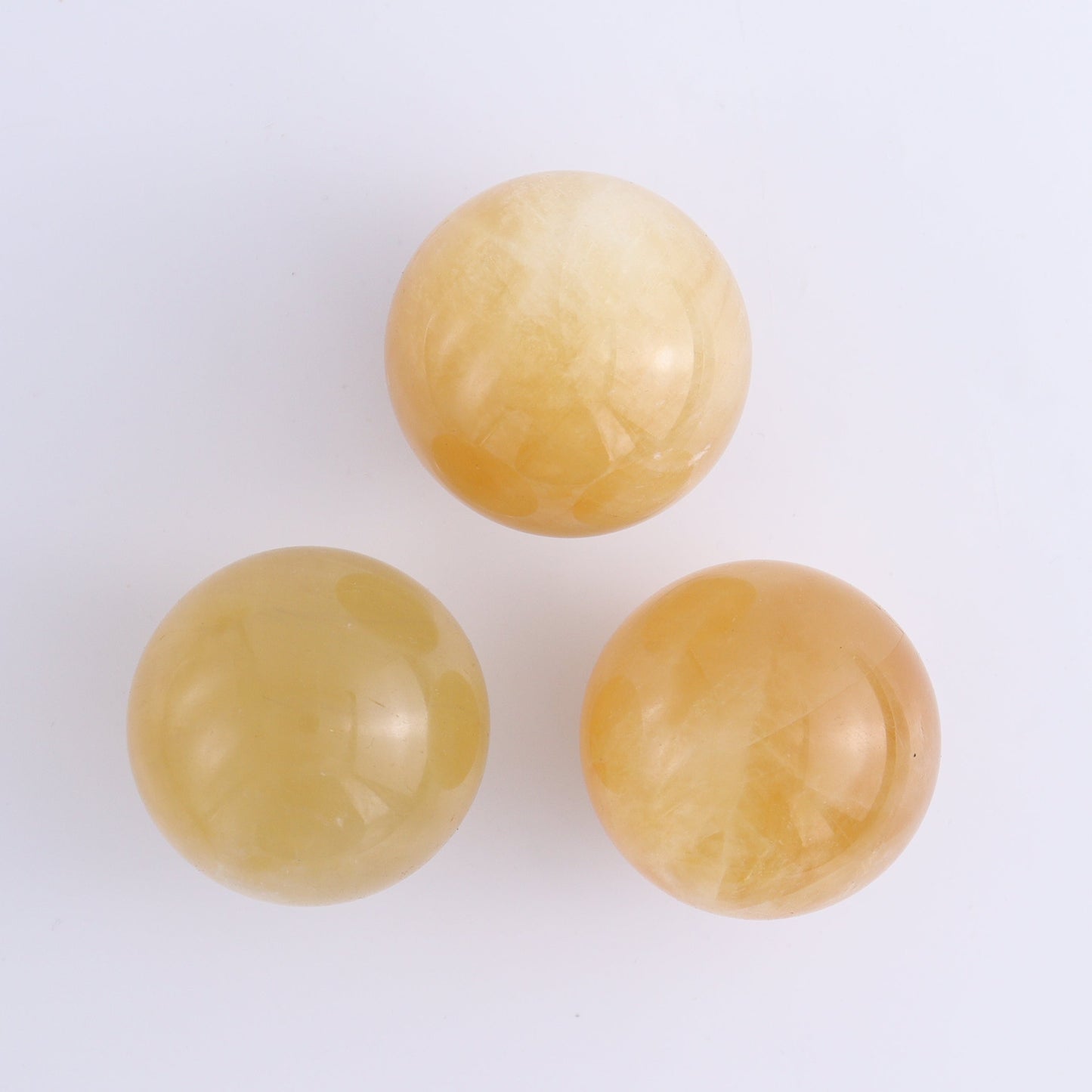 Calcite Spheres Set of 9 - Expert Wholesale and Supplier of Wholesale Crystals & Bulk Gemstones, ["Calcite","Mexico","Spheres"]
