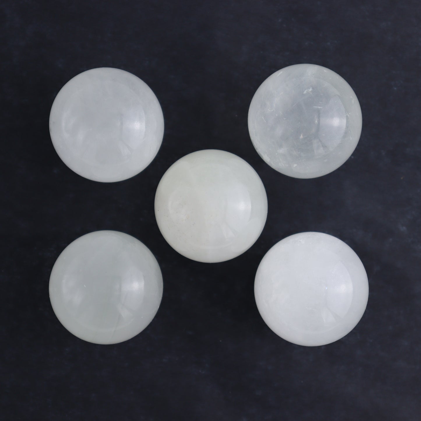 Optical Calcite Spheres Set of 12 - Expert Wholesale and Supplier of Wholesale Crystals & Bulk Gemstones, ["Calcite","Mexico","Optical Calcite","Spheres"]