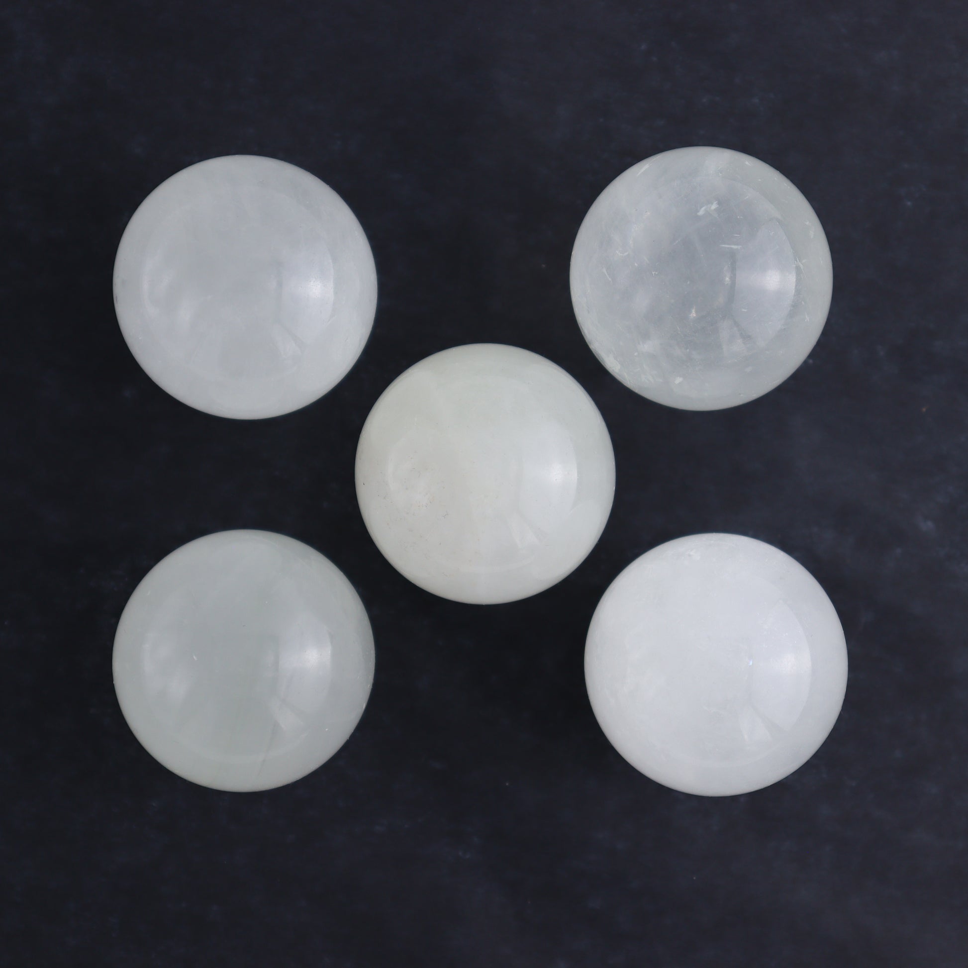 Optical Calcite Spheres Set of 12 - Expert Wholesale and Supplier of Wholesale Crystals & Bulk Gemstones, ["Calcite","Mexico","Optical Calcite","Spheres"]