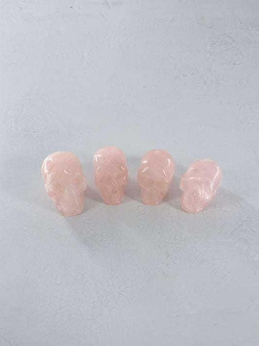 Rose Quartz Skulls Set of 4 - Expert Vendor of Wholesale Crystals