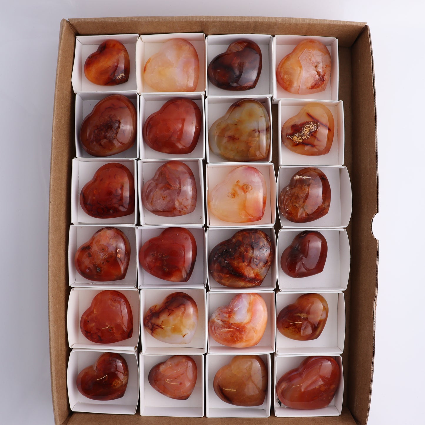 Carnelian Hearts Flat of 24 - Expert Wholesale and Supplier of Wholesale Crystals & Bulk Gemstones, ["carnelian","Hearts","Madagascar"]