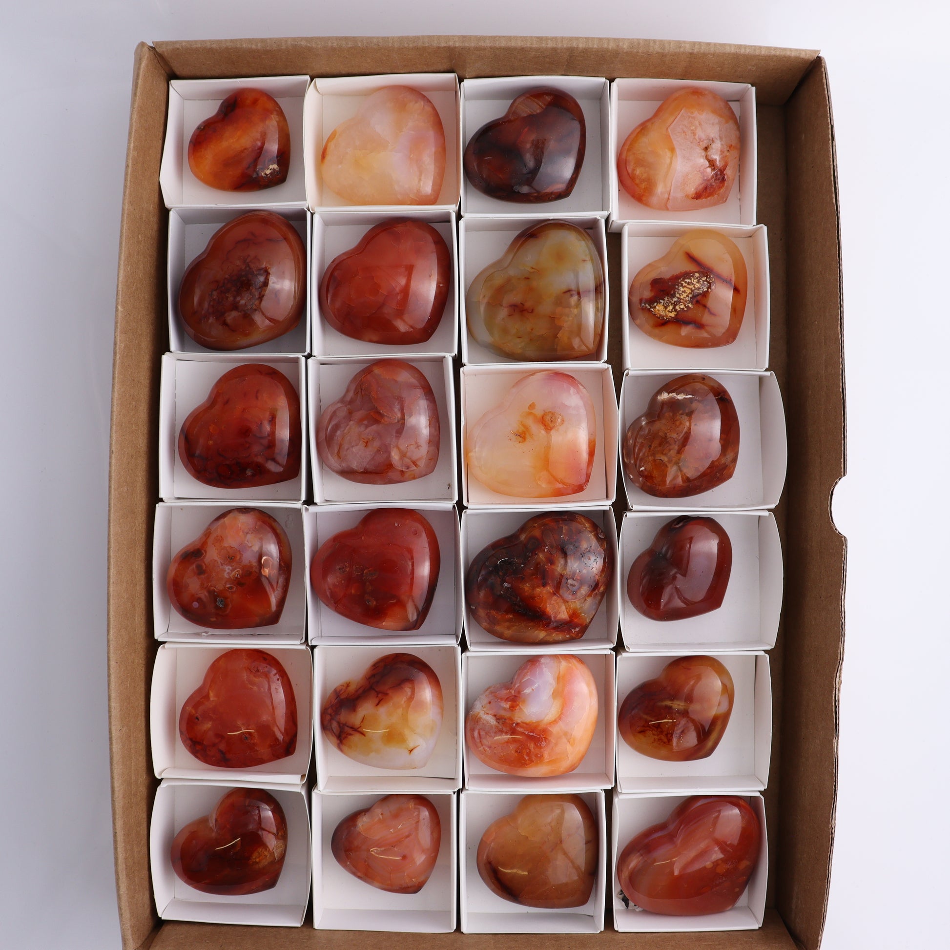 Carnelian Hearts Flat of 24 - Expert Wholesale and Supplier of Wholesale Crystals & Bulk Gemstones, ["carnelian","Hearts","Madagascar"]
