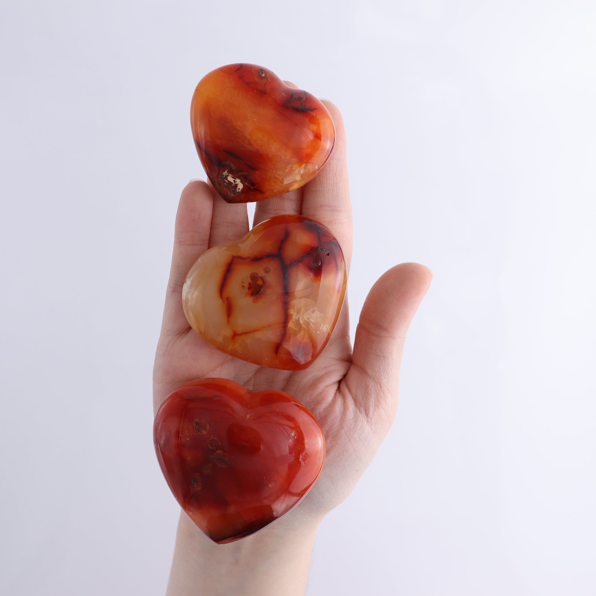 Carnelian Hearts Flat of 24 - Expert Wholesale and Supplier of Wholesale Crystals & Bulk Gemstones, ["carnelian","Hearts","Madagascar"]