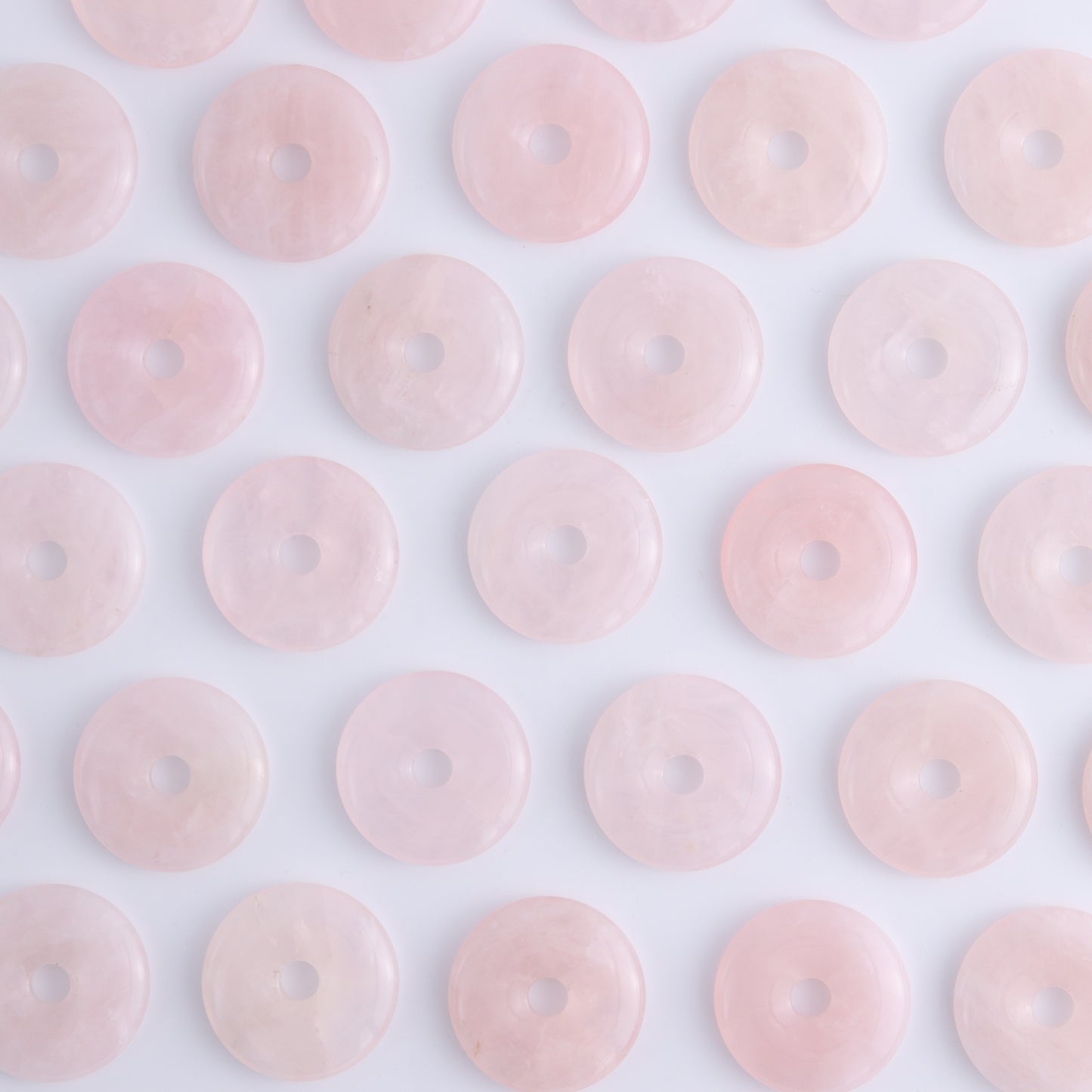 One Rose Quartz Donut - Expert Wholesale and Supplier of Wholesale Crystals & Bulk Gemstones, ["Donut","Rose Quartz"]