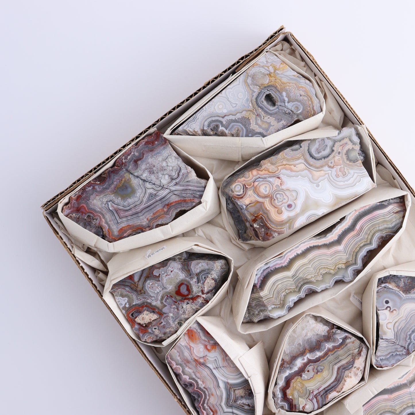 Crazy Lace Agate Flat of 10 - Expert Wholesale and Supplier of Wholesale Crystals & Bulk Gemstones, ["Crazy Lace Agate","Mexico"]