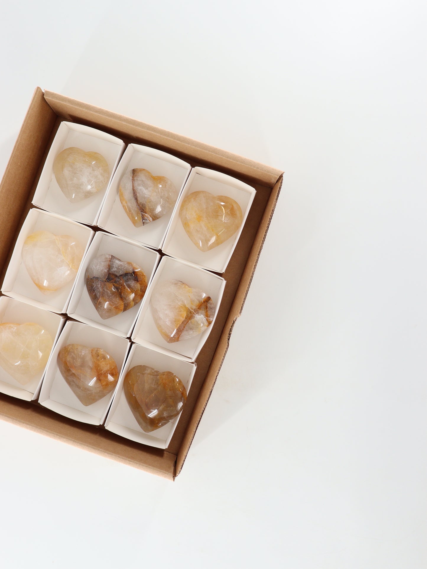 Golden Healer Quartz Hearts Set of 9 - Expert Wholesale and Supplier of Wholesale Crystals & Bulk Gemstones, []