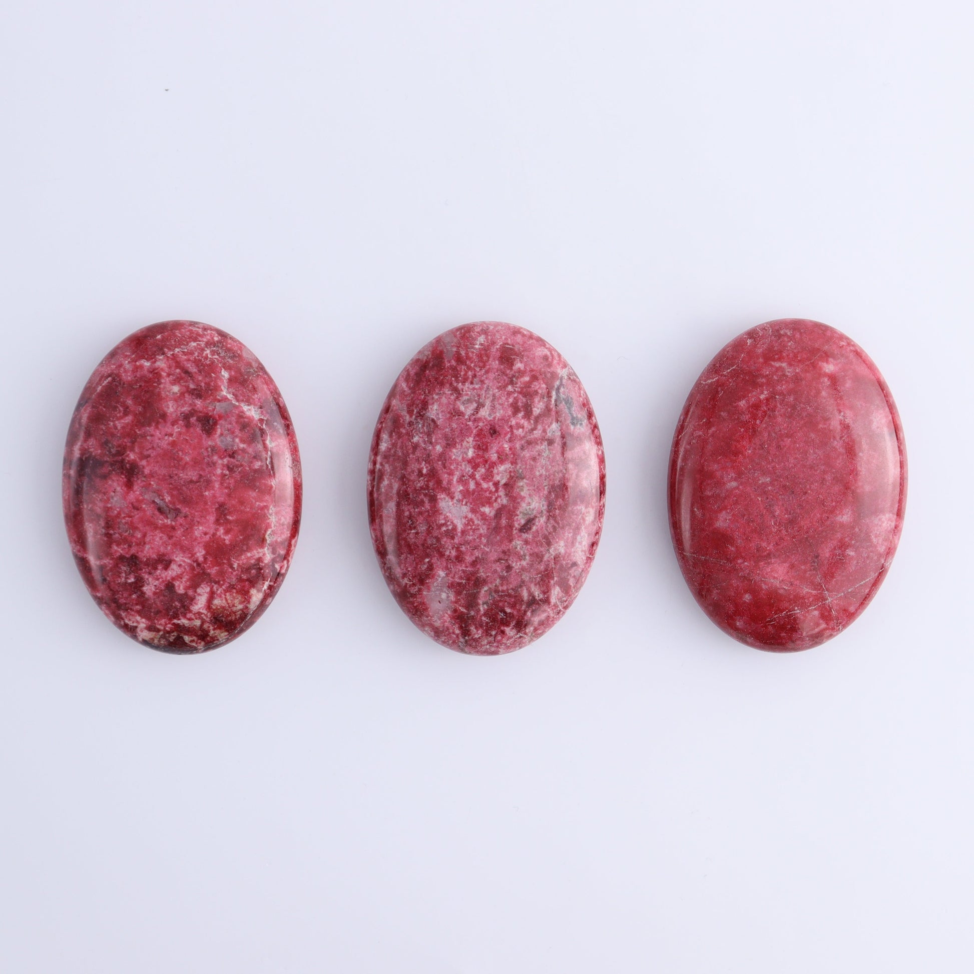 Thulite Palm Stones Set of 3 - Expert Wholesale and Supplier of Wholesale Crystals & Bulk Gemstones, ["Palm Stones","thulite"]